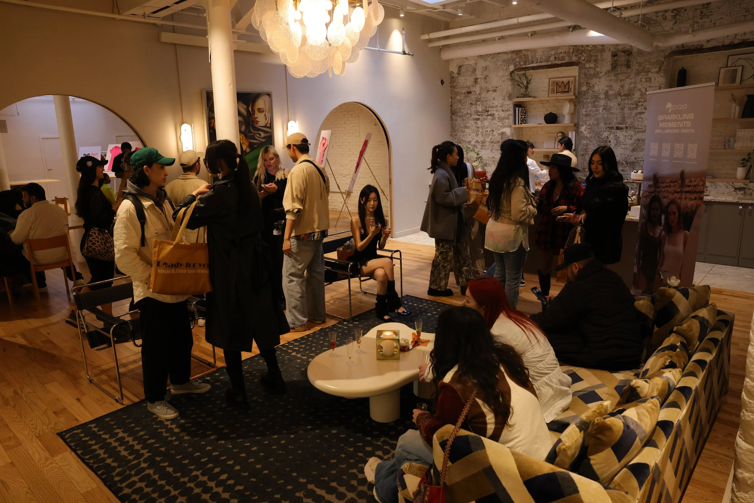 The lounging area of Women's Activewear, Gymwear, and Athleisure brand OQQ's press conference in Williamsburg.