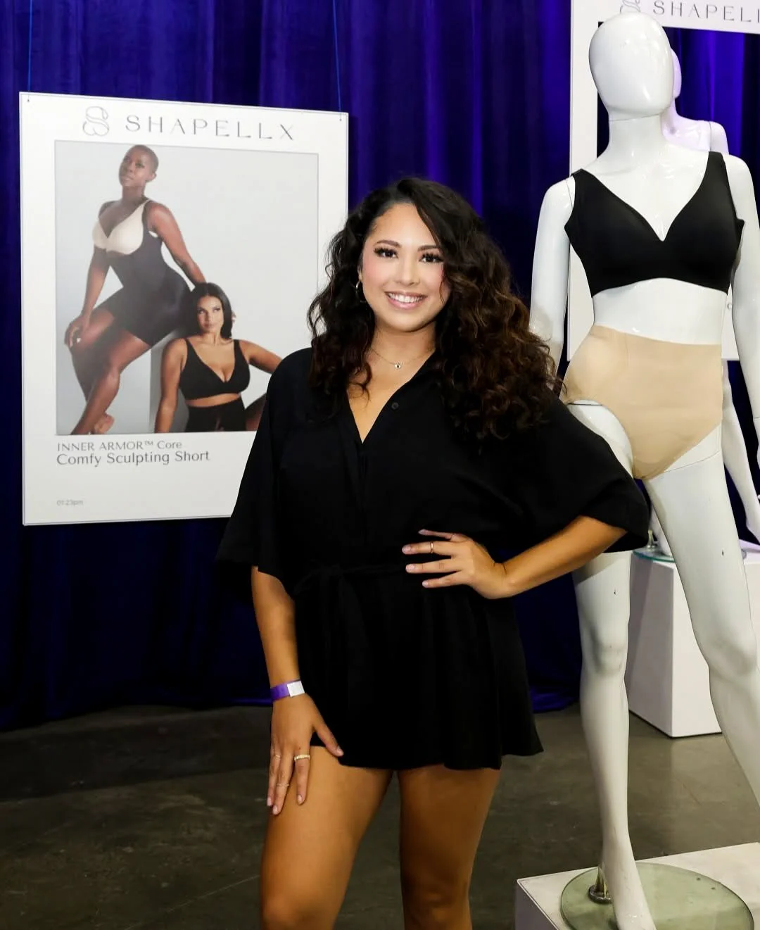 A fashion KOL posing with the fashion presentation of shapewear brand Shapellx's 6th anniversary activation, Six and Beyond, in a Hollywood studio in Los Angeles.