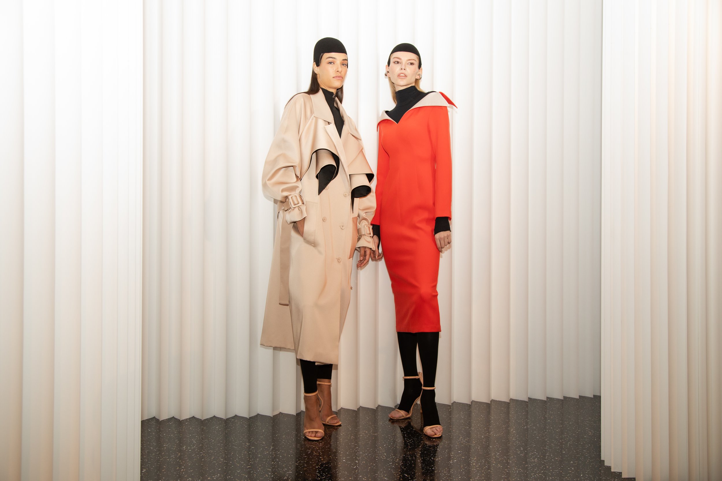 VICKTEERUT models posing at the runway opening of "Up to the Sky" Bangkok designer fashion show during NYFW at One World Observatory by experiential production agency ANG Concept.