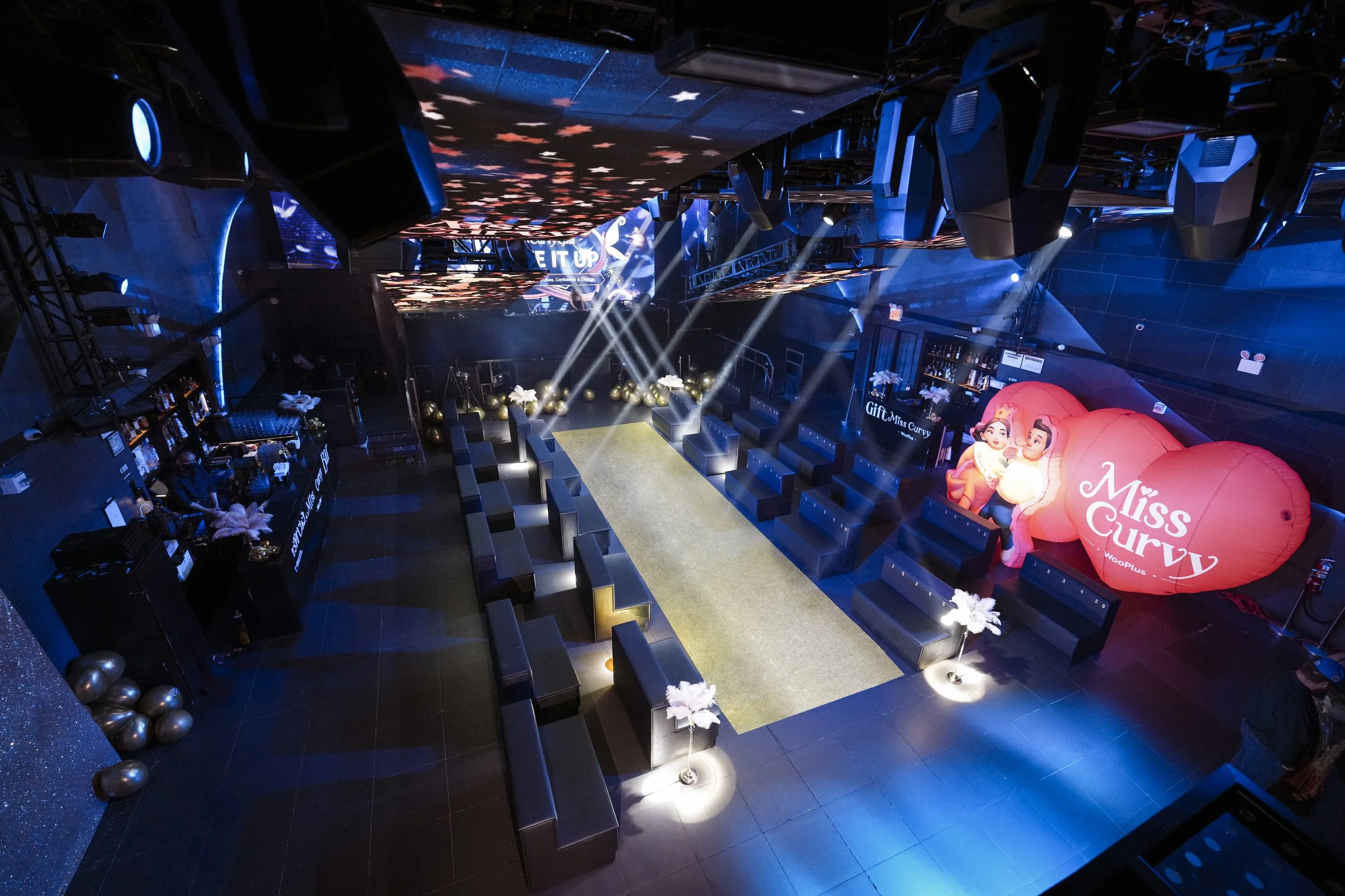 Drone view of the space of Times Square nightclub Nebula for Miss Curvy Pageant NYFW runway show of WooPlus by event production agency ANG Concept.