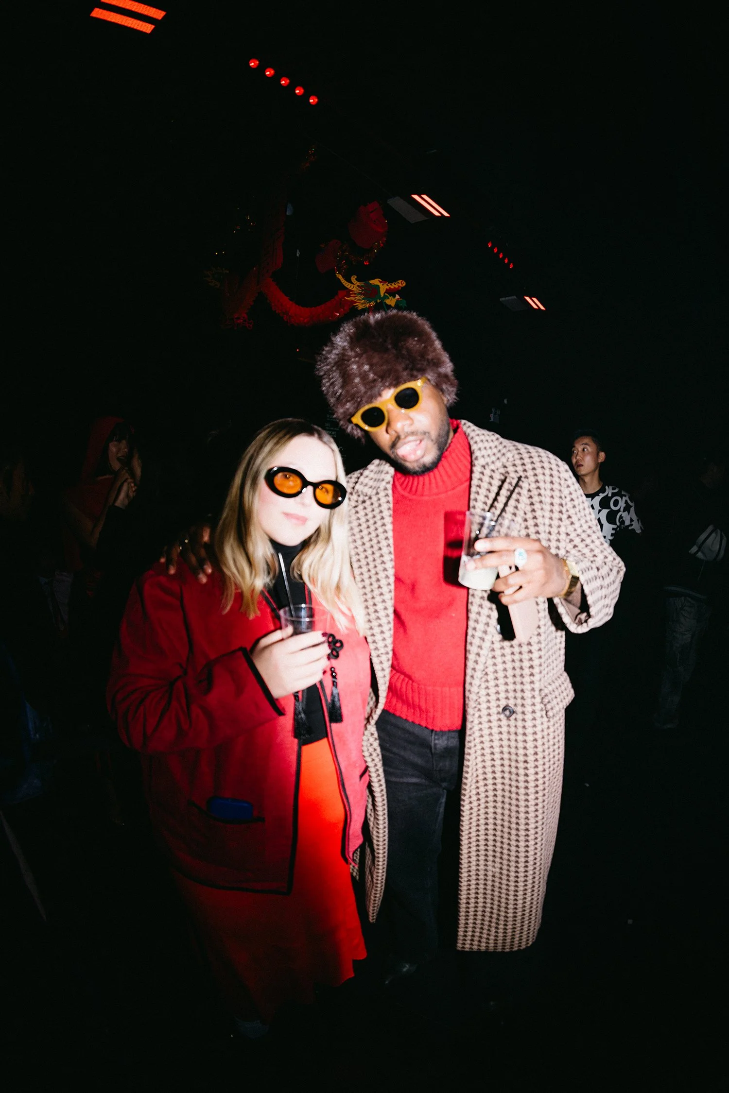 Two fashion KOLs enjoying experiential production agency ANG Concept's Lunar New Year Party.