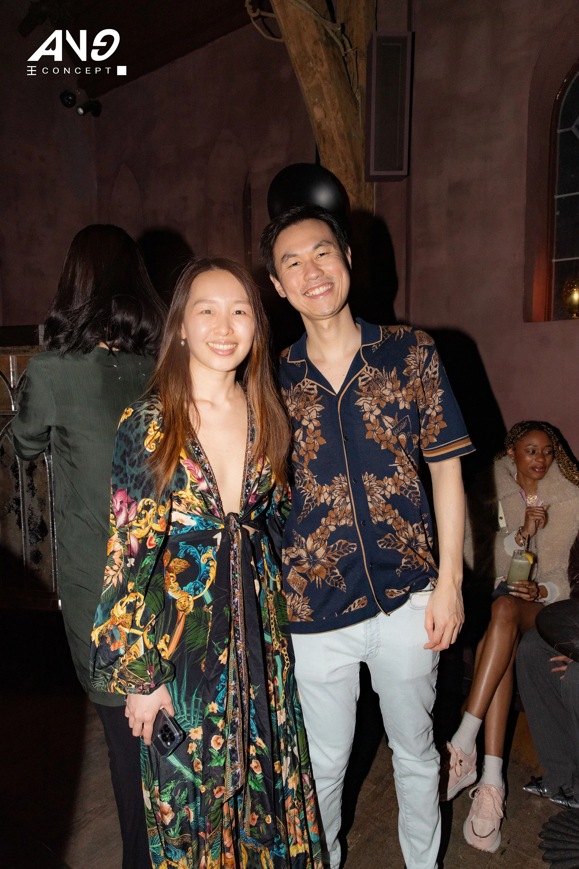 Two VIP guests smiling to the camera at "La Genèse", the debut party activation by ANG Concept, at Chapel Bar in New York.