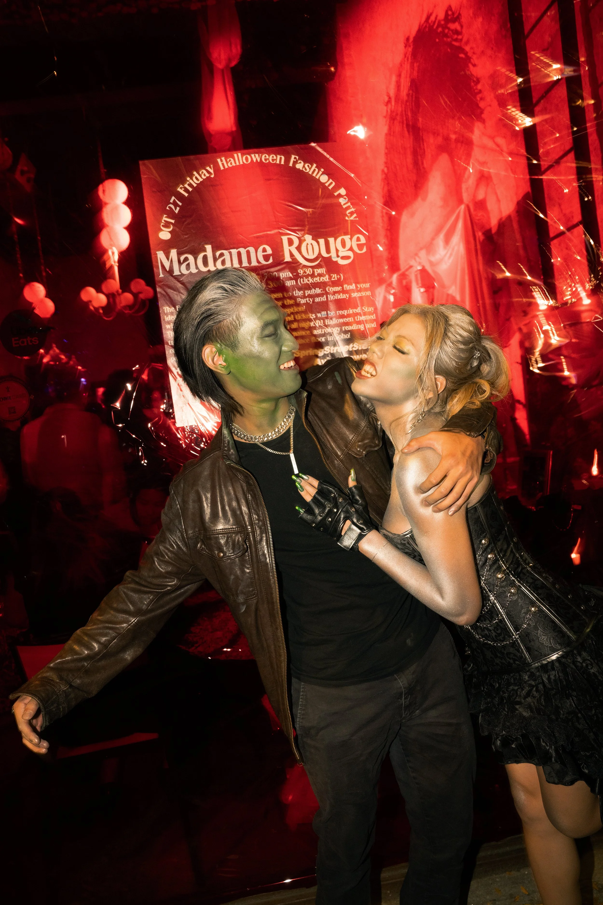Two people dancing in front of Madame Rouge Halloween fashion party by New York event production agency ANG Concept.