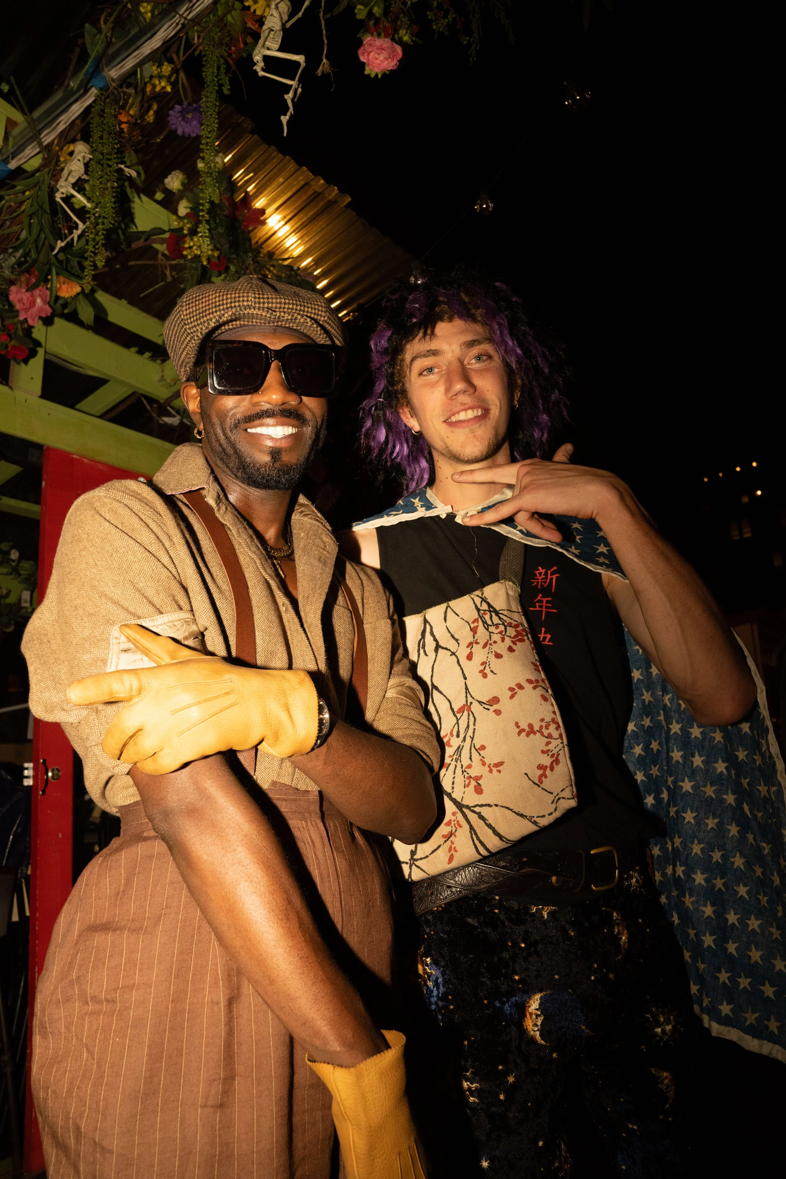 Two guests posing together for Madame Rouge, a Halloween event in New York by creative production agency ANG Concept.