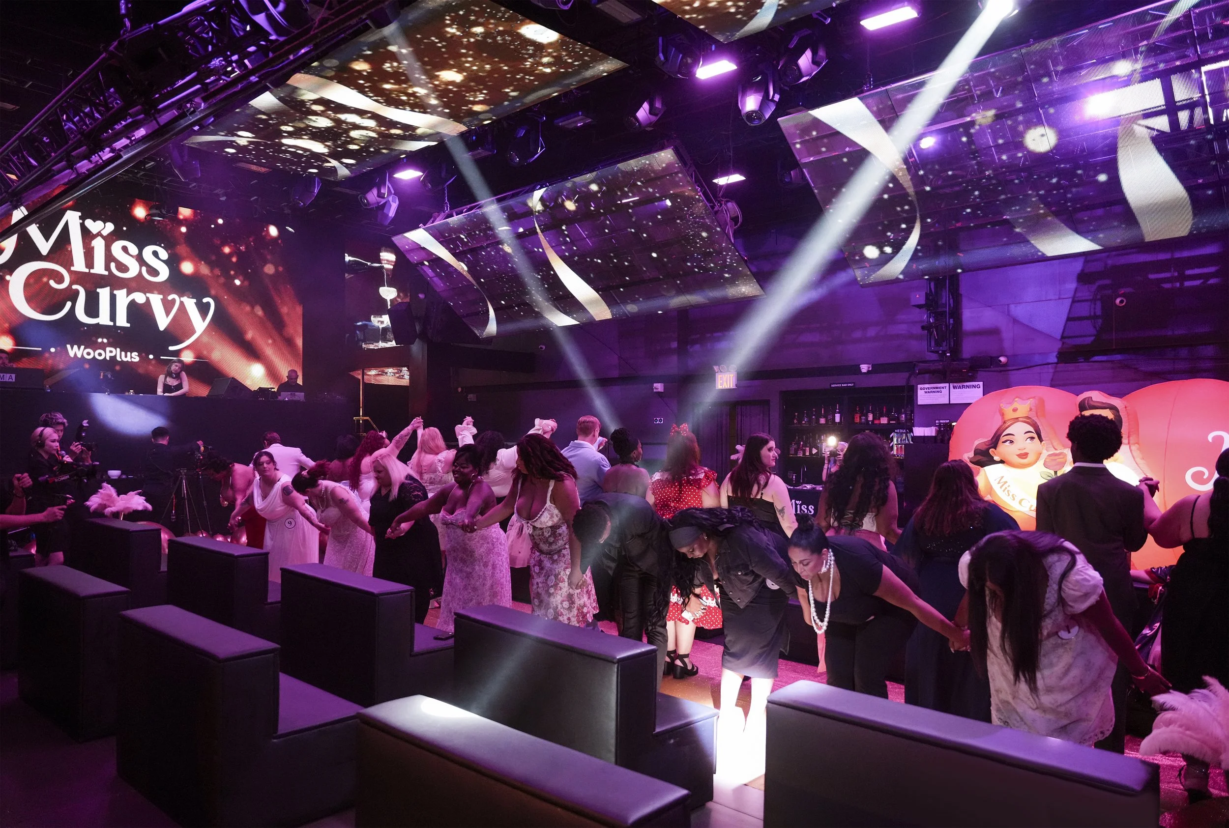 A group of diverse models rehearsing for a fashion show production by experiential agency ANG Concept in the nightclub Nebula for the Miss Curvy Pageant by dating app WooPlus. 