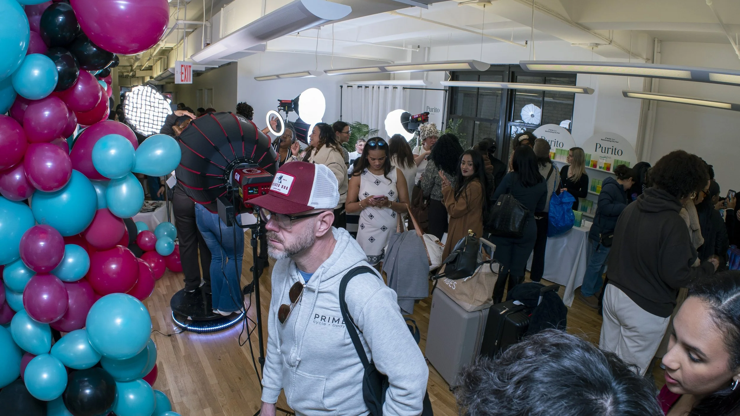 Interior of the busy event space for TikTok Matchmaking City Tour by experiential production agency ANG Concept in New York.