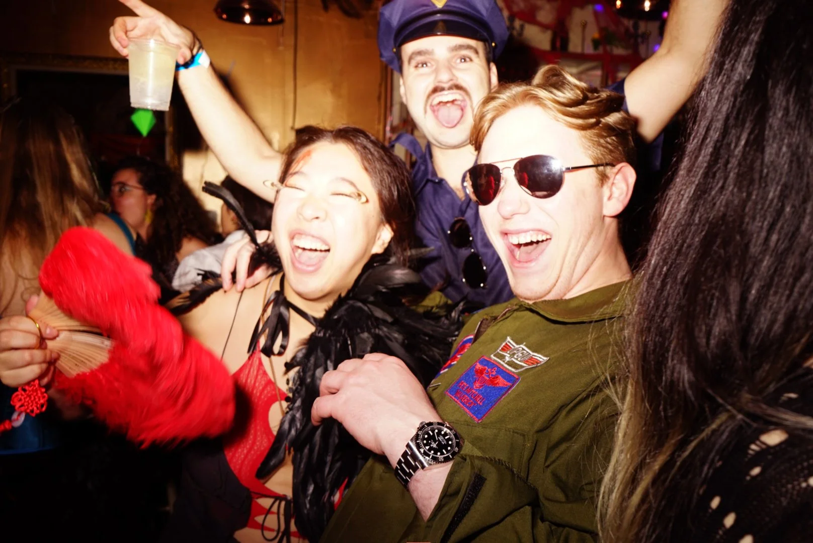 Group of friends celebrating at Madame Rouge, a Halloween party by event production agency ANG Concept.