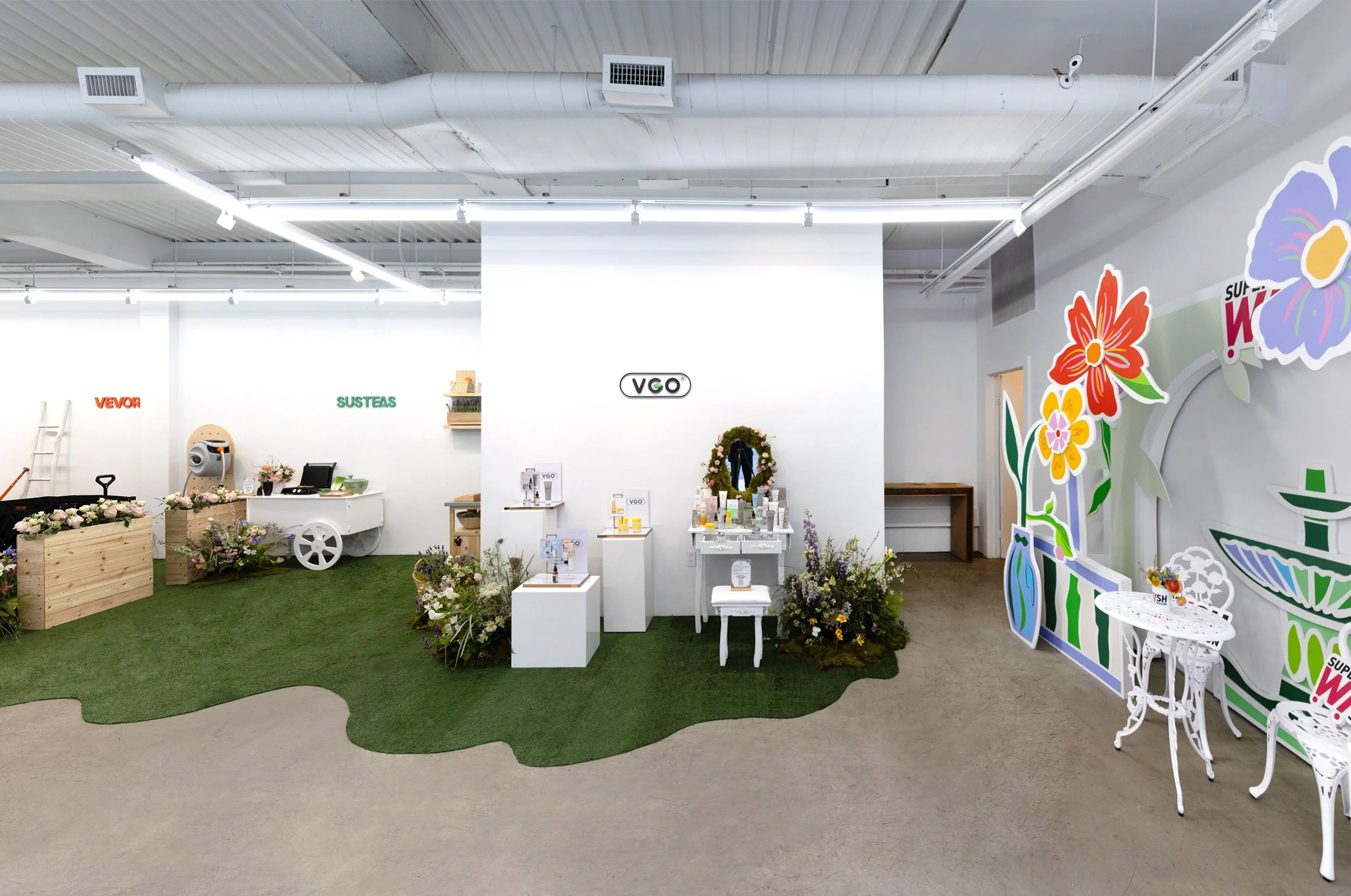 Spatial shot (right side) of the TikTok Super Wish Season pop-up activation featuring brands Susteas, Vevor, Vgo Beauty, and the custom-branded photo booth. Designed and produced by experiential production agency ANG Concept.