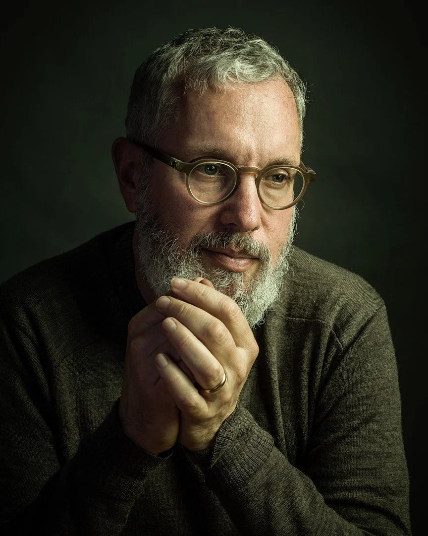 Colour studio portrait of American photographer Ken Scales