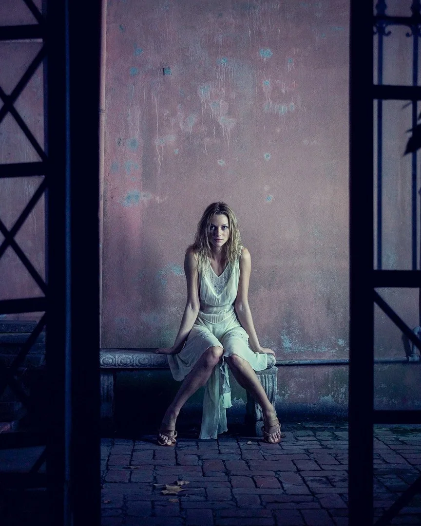 Colour Portrait of a girl sitting in a doorway in New Orleans