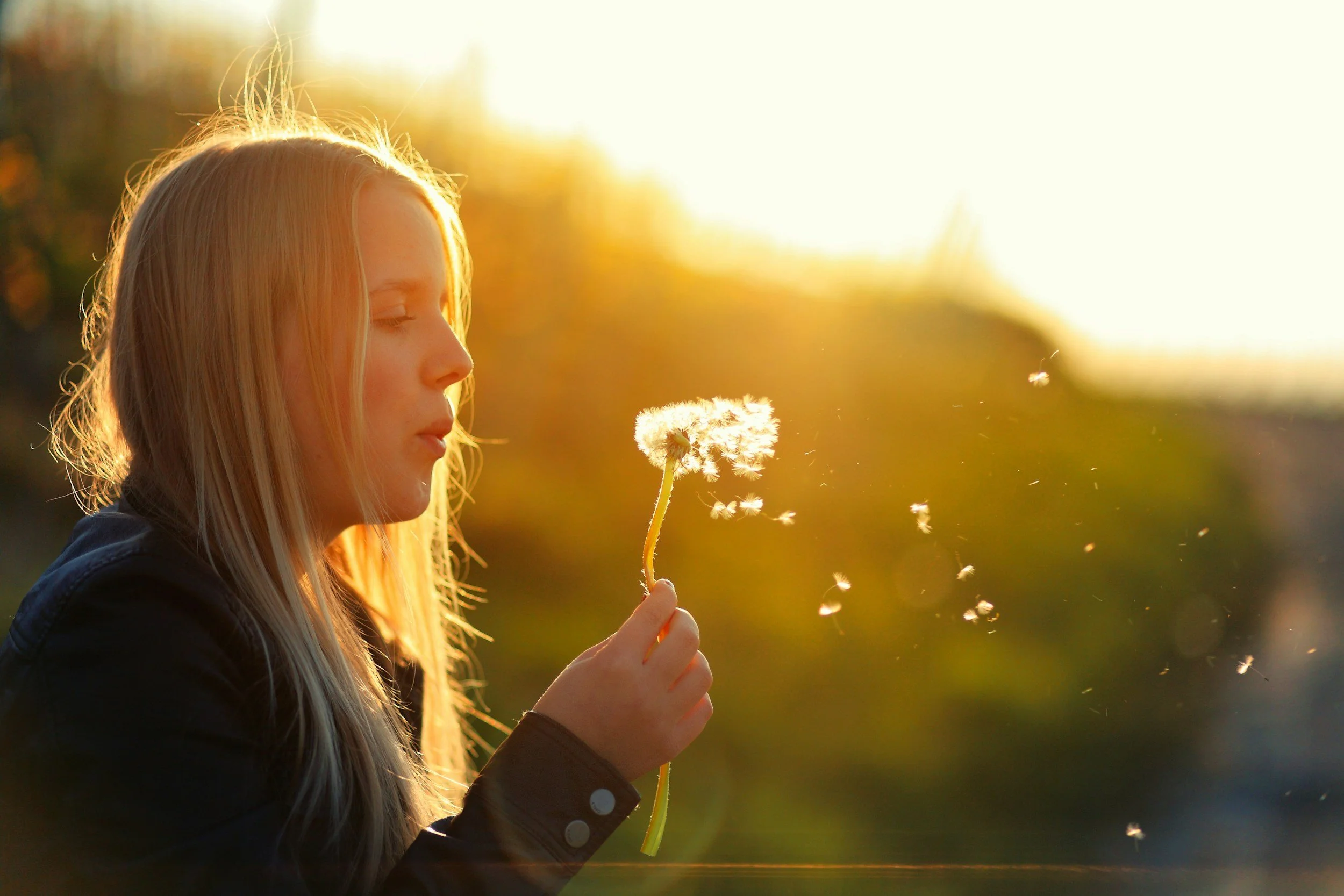 A relaxed child or teen smiling in a bright, welcoming environment, representing emotional confidence, focus, and stress relief through youth hypnotherapy at Timpanogos Hypnotherapy.