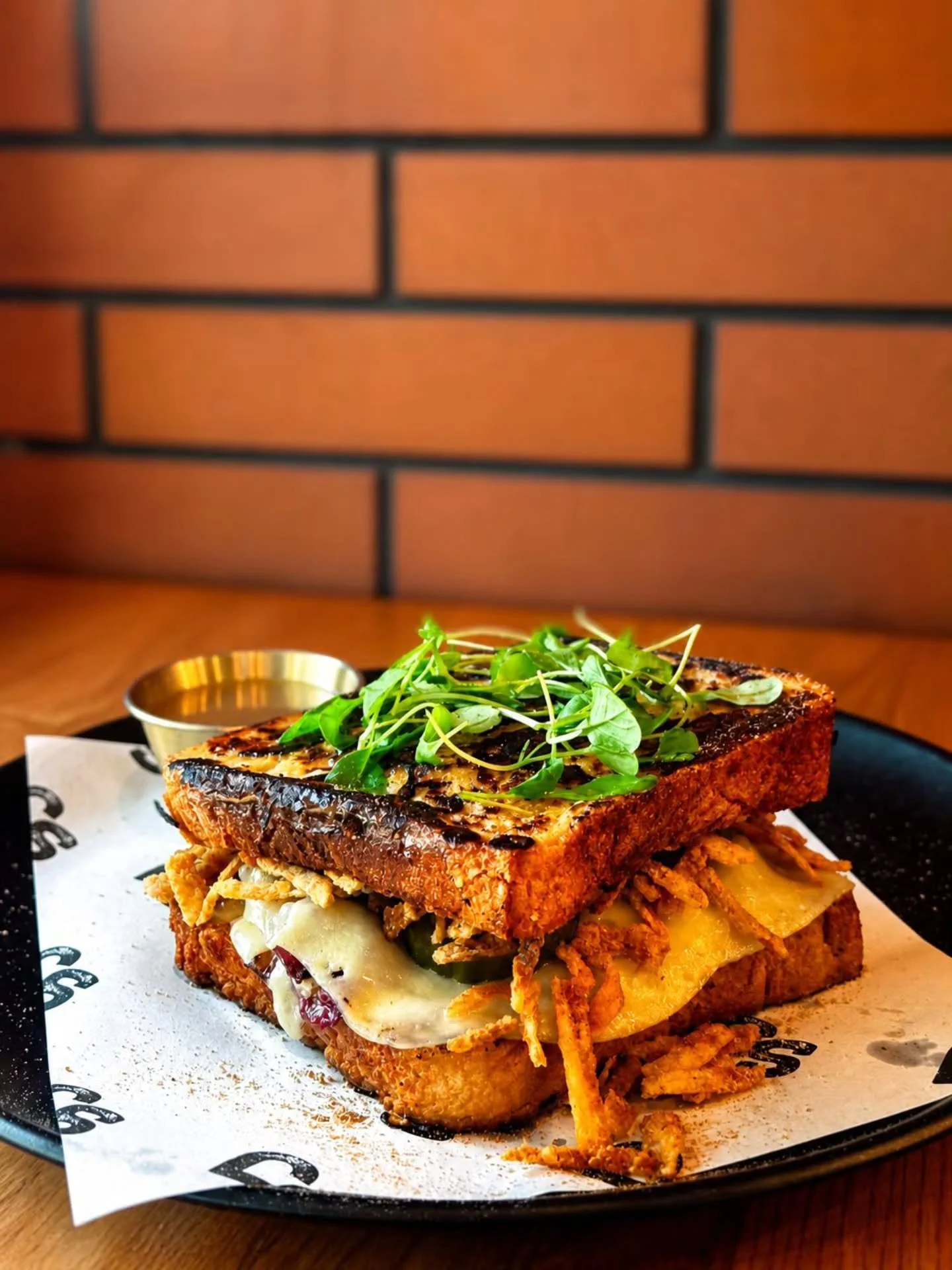Say hello to 𝐓𝐡𝐞 𝐃𝐢𝐫𝐭𝐲 𝐅𝐫𝐞𝐧𝐜𝐡𝐢𝐞 👀🔥

Golden French toast (yes, you heard right)  loaded with juicy minced lamb, melted cheese, crispy potatoes and just the right hit of garlic mayo &amp; honey mustard.

Messy, indulgent, and 100% wor