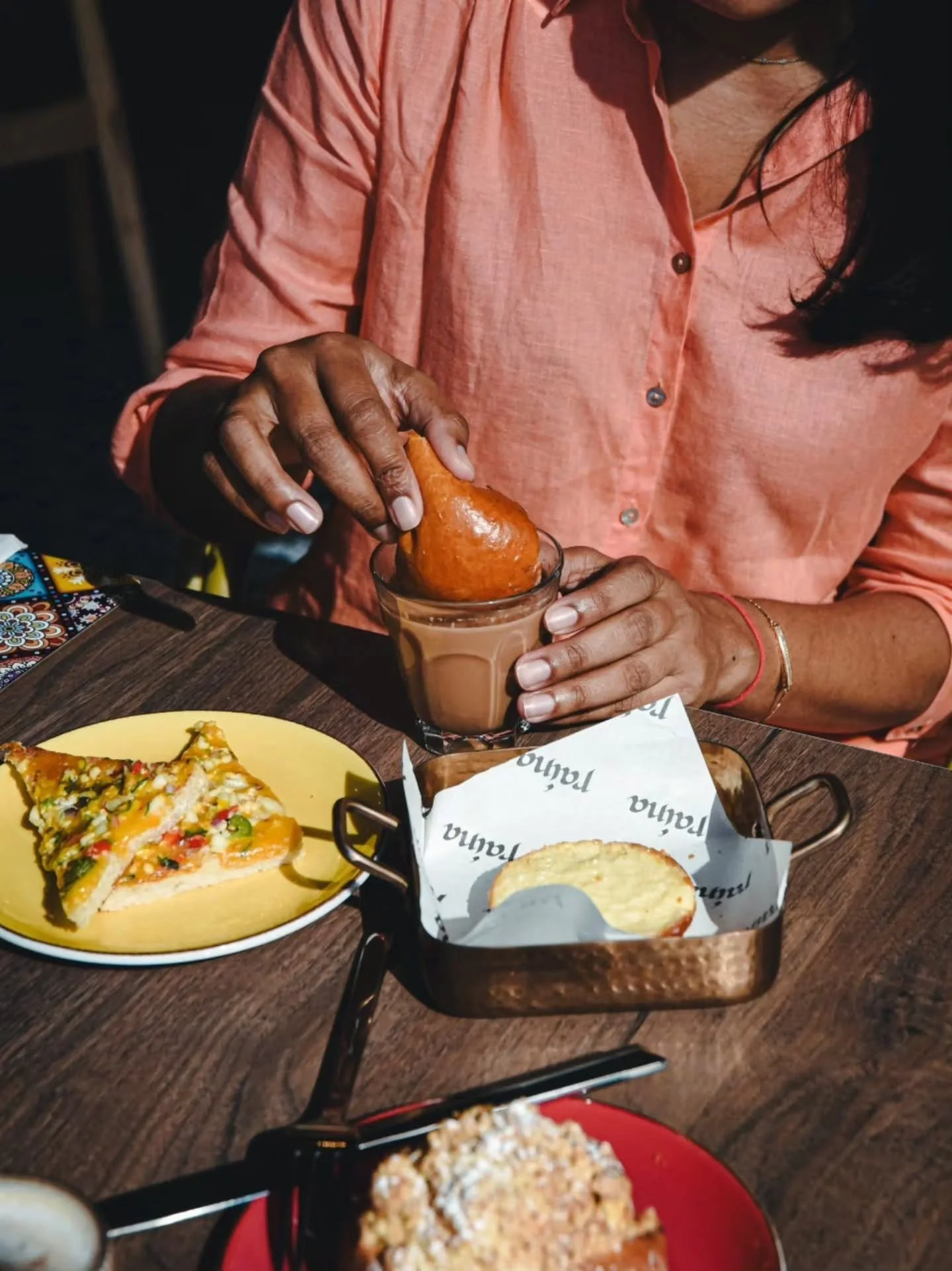There&rsquo;s only one proper way to enjoy our Maska Bun. Tear off a soft, buttery piece of bun and dunk it, not once but twice, into a steaming glass of cutting chai. The salty maska melts beautifully, while the bread soaks up just enough spice to w
