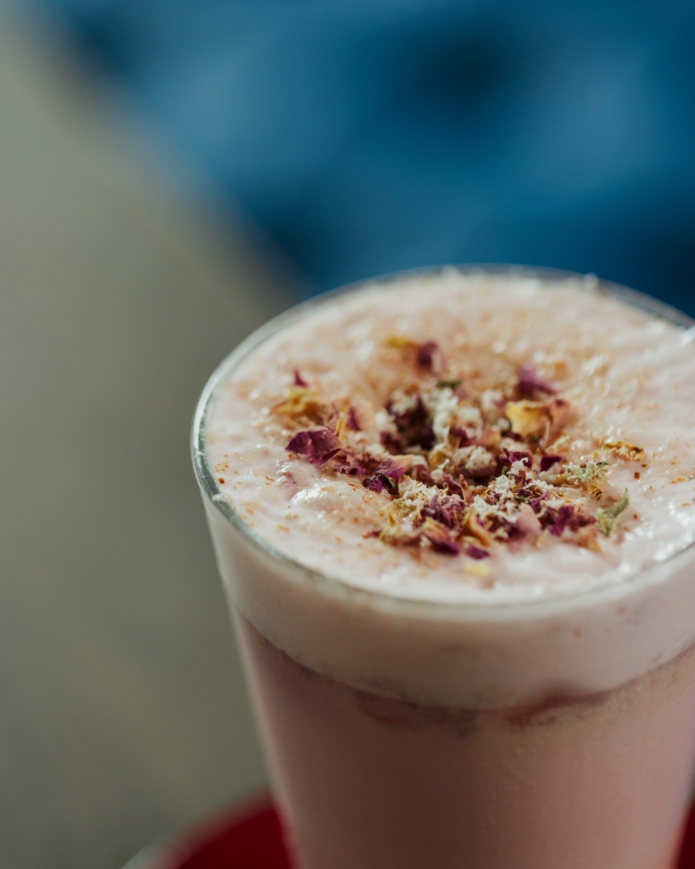 At 𝐑𝐚𝐢𝐧𝐚, some drinks arrive like a small celebration. ✨

The 𝐆𝐮𝐥𝐤𝐡𝐚𝐧 𝐓𝐡𝐚𝐧𝐝𝐚𝐢 is rich with rose petals, saffron, nuts, milk, and fragrant spices &mdash; floral, chilled, and quietly extravagant.

And then there&rsquo;s the 𝐌𝐚𝐡𝐚