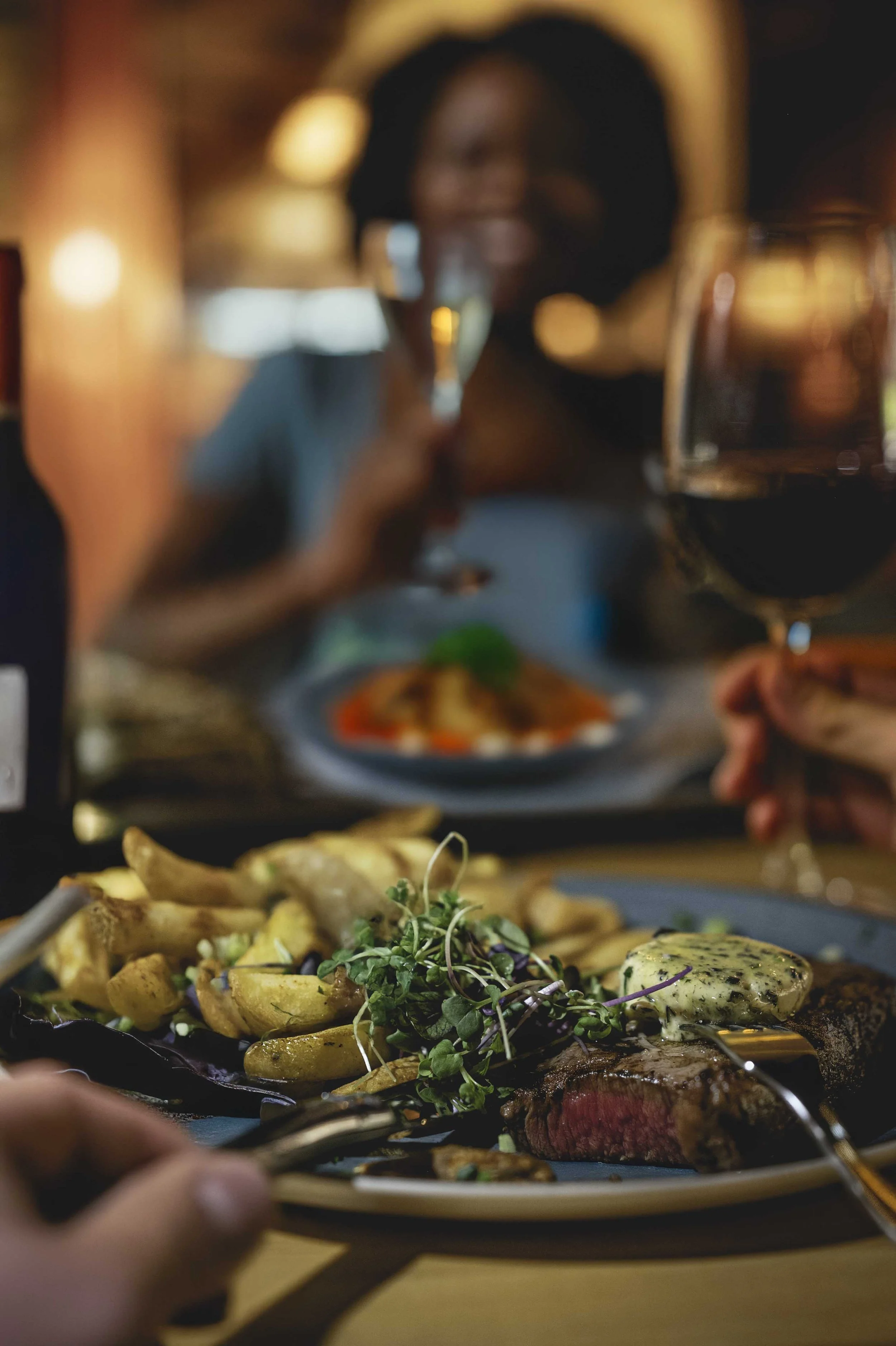 couple eating steak.jpg
