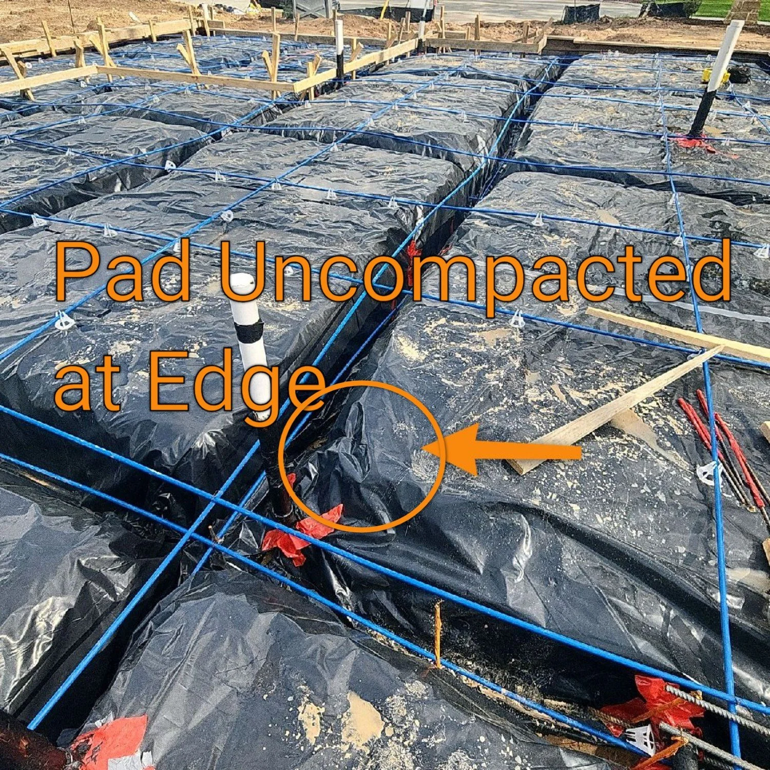 Phase 1 pre-pour foundation inspection photo showing multiple slab preparation defects clearly marked with colored arrows on the forms, rebar, and post-tension cables for the builder to correct before concrete placement.