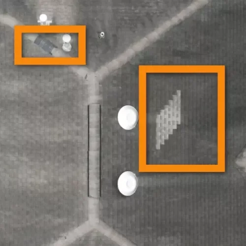 Drone photo of a residential roof in Spring, Texas showing visible shingle and flashing defects documented during a roof inspection.