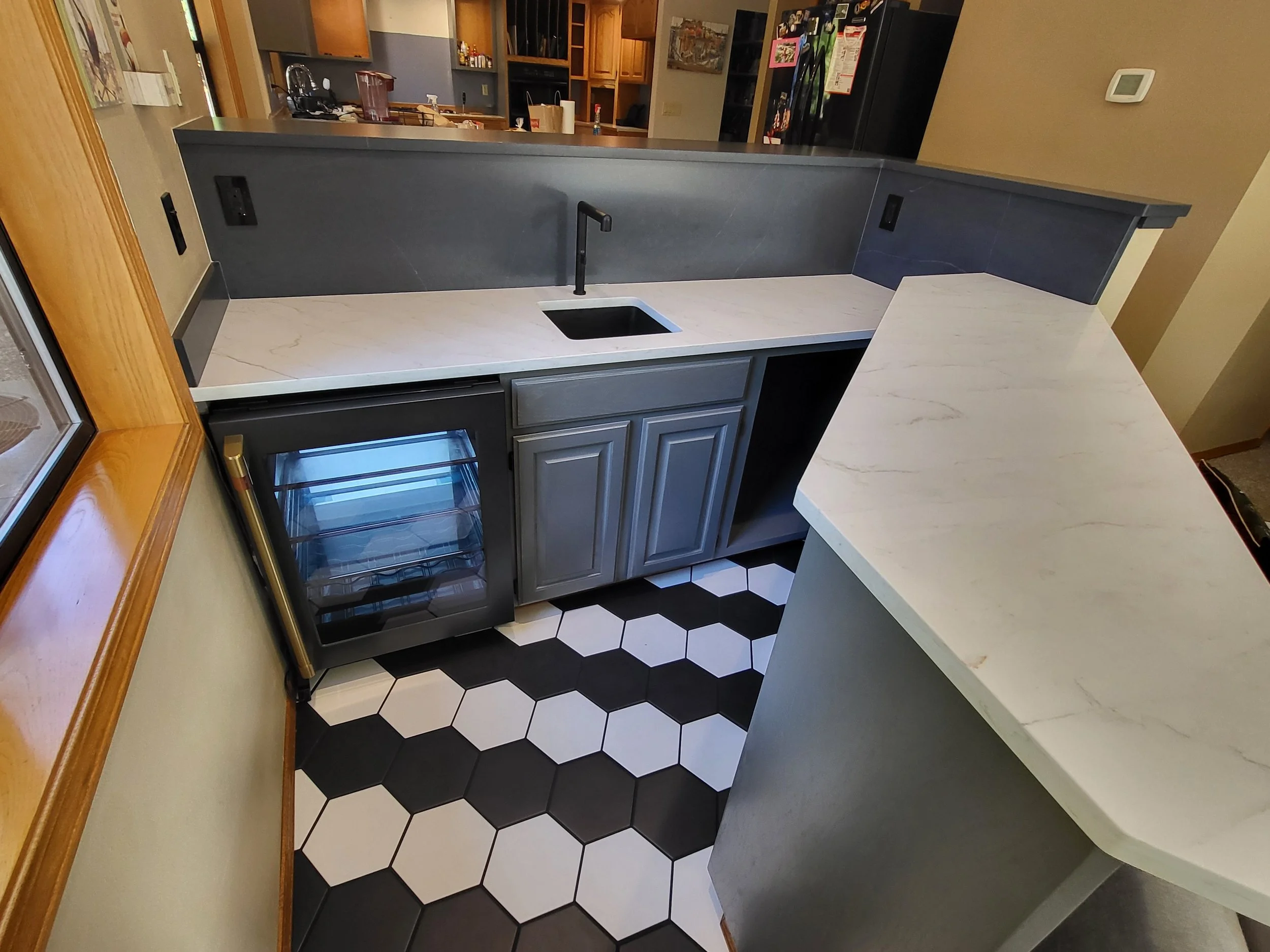 To sleek modern entertaining area