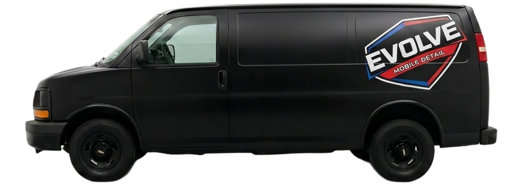 Black commercial van with a logo that reads 'Evolve Mobile Detail' on the side.