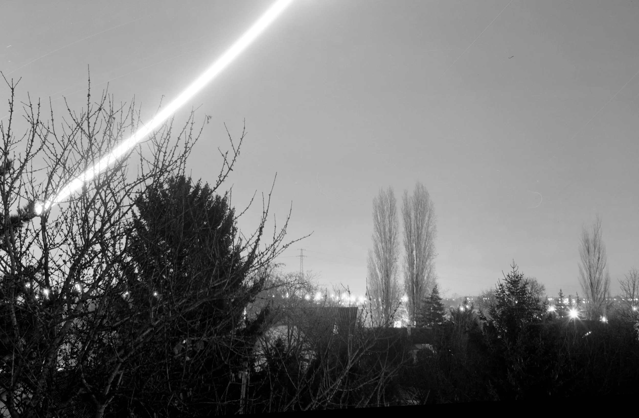 Moontrail |
Camera: Zeiss Ikon Ercona |
Lens: Novonar 110mm f/4.5 |
Film: Kentmere 100 |
Exposure time: 3 hrs @f/16 |
Location: Budapest, Hungary |
Date: 2023-11-29