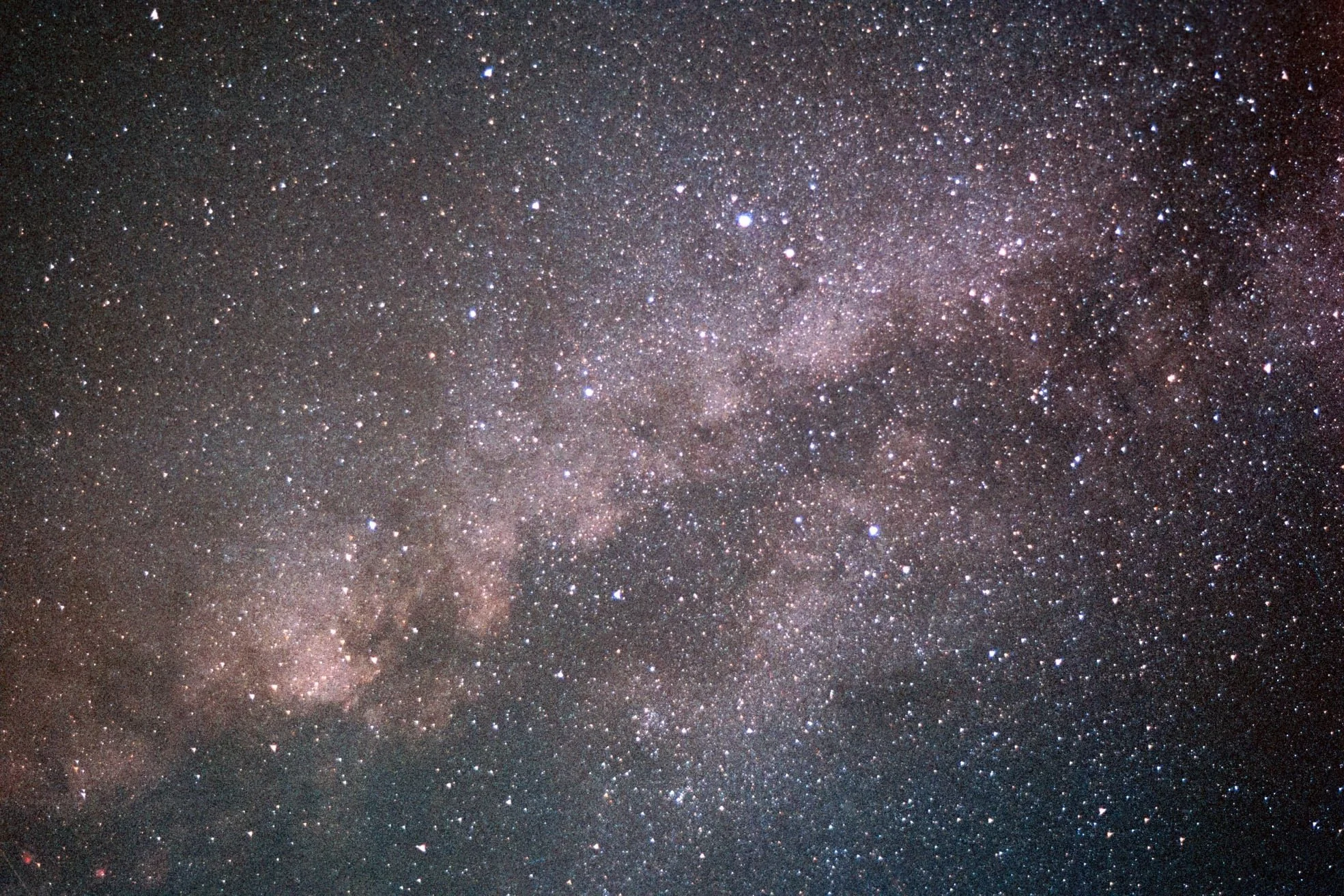 Milky Way |
Camera: Minolta XD 5 |
Lens: Minolta Rokkor 35mm f/2.8 |
Film: Fujifilm Superia 400 |
Exposure time: 5 min @f/2.8 |
Location: Zselic, Hungary |
Date: 2021-09-10