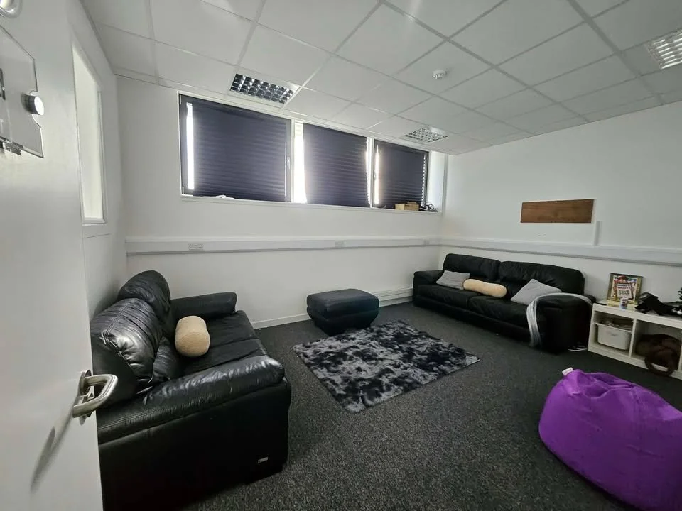 A calm and low-stimulation environment designed to support emotional regulation and wellbeing. With soft furnishings, muted lighting, and comfortable seating, this room offers a safe space for individuals who may need time away from busy environments