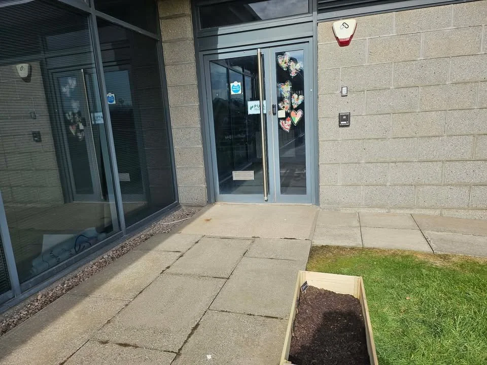 Our main entrance provides a warm and welcoming first impression, with easy access into the building. The space is bright, secure, and designed to help individuals feel comfortable and confident as they arrive for the day.