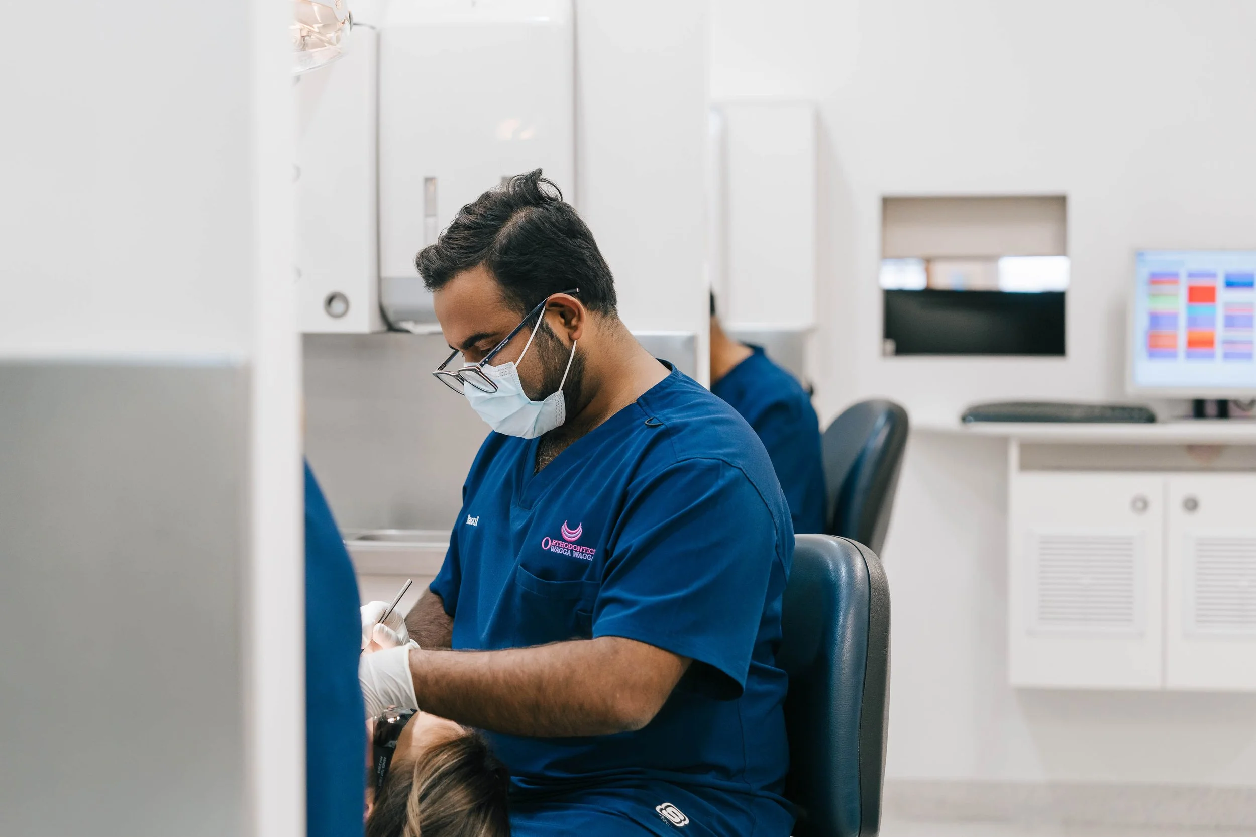 Orthodontist, Raoul Mascarenha working on a patient in the Wagga Wagga Clinic clinic.