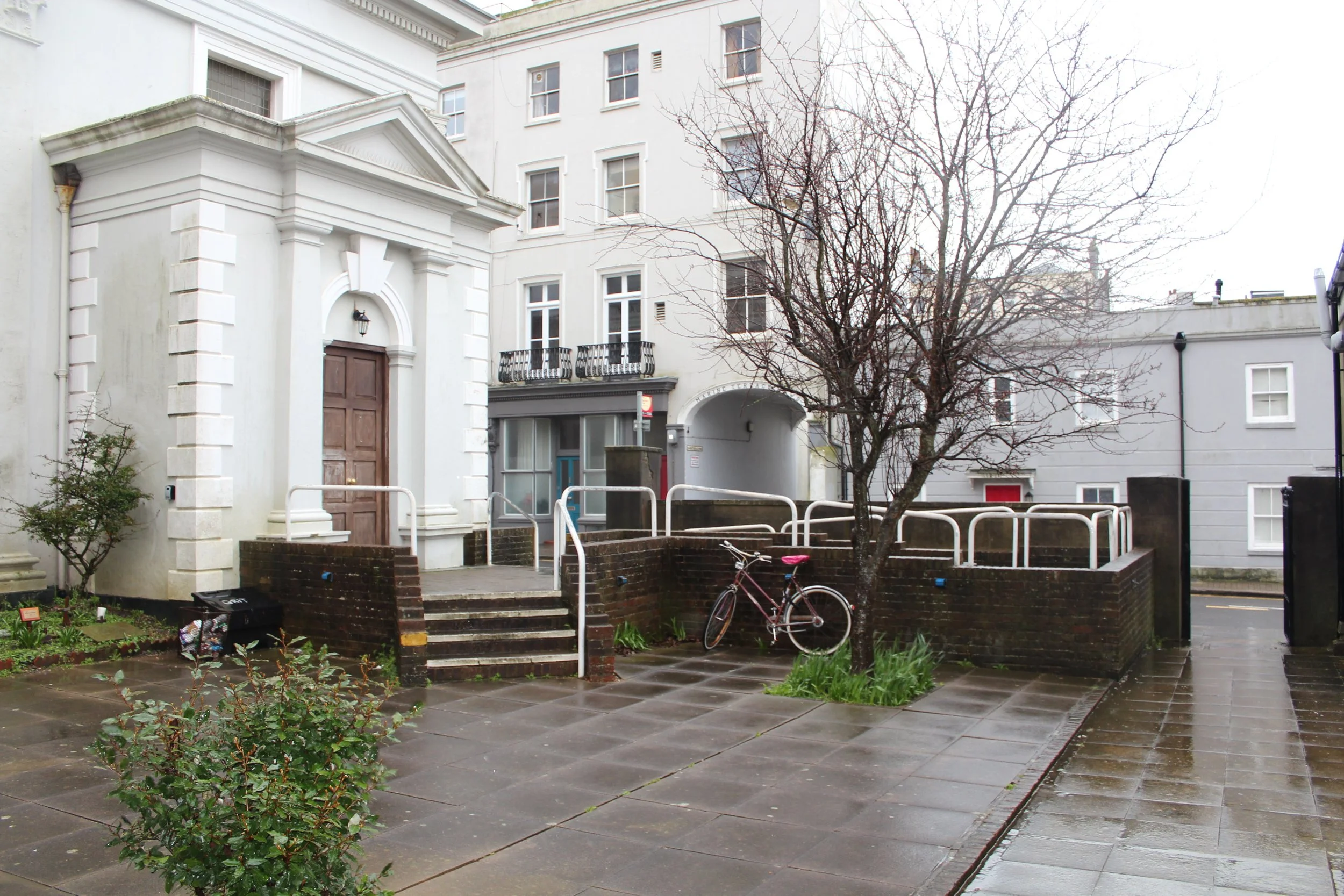 Utilitarian ramps to the Grade II* listed John the Baptist Catholic Church