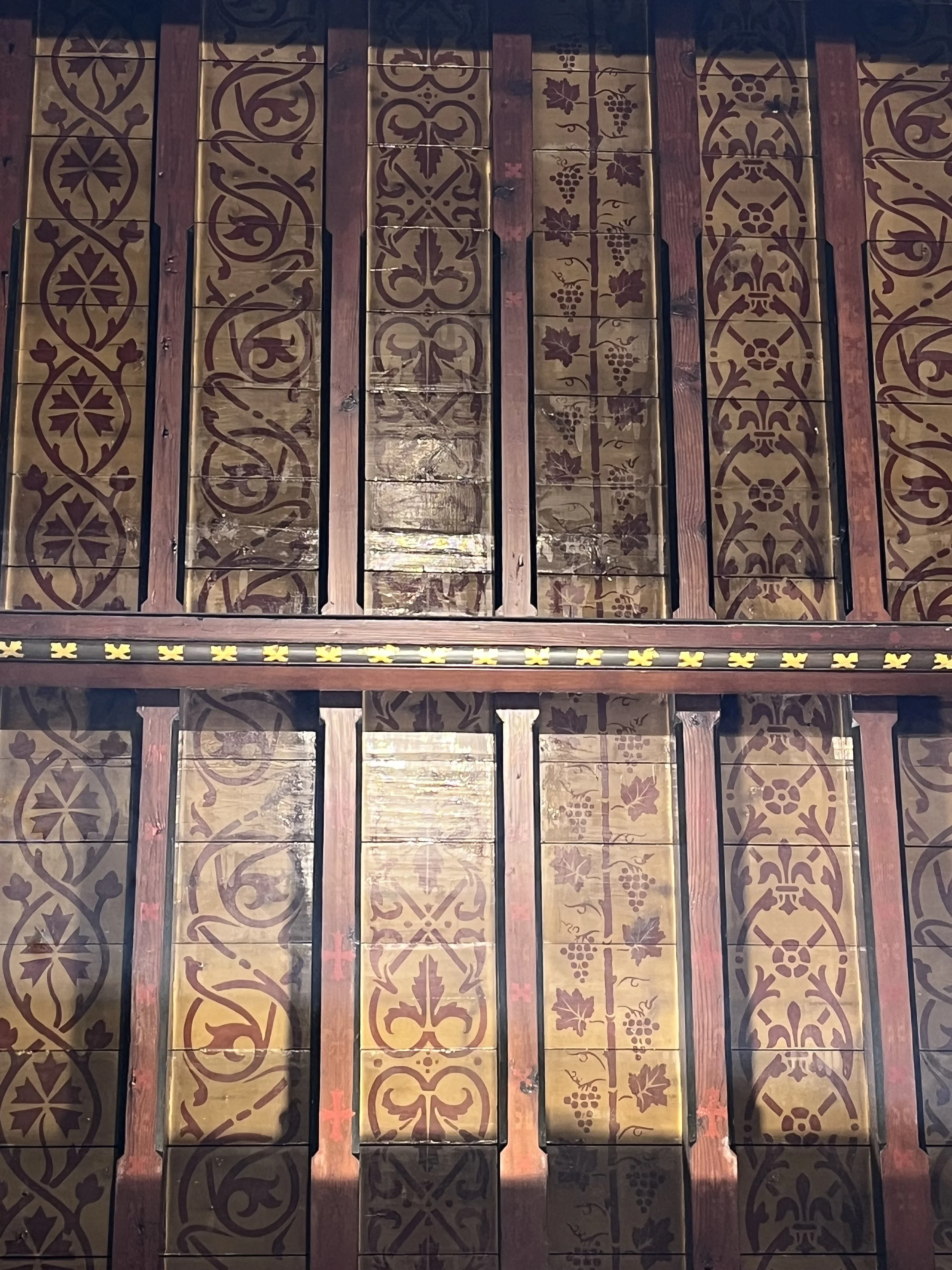 View up to the chancel roof which is painted in the style of Pugin