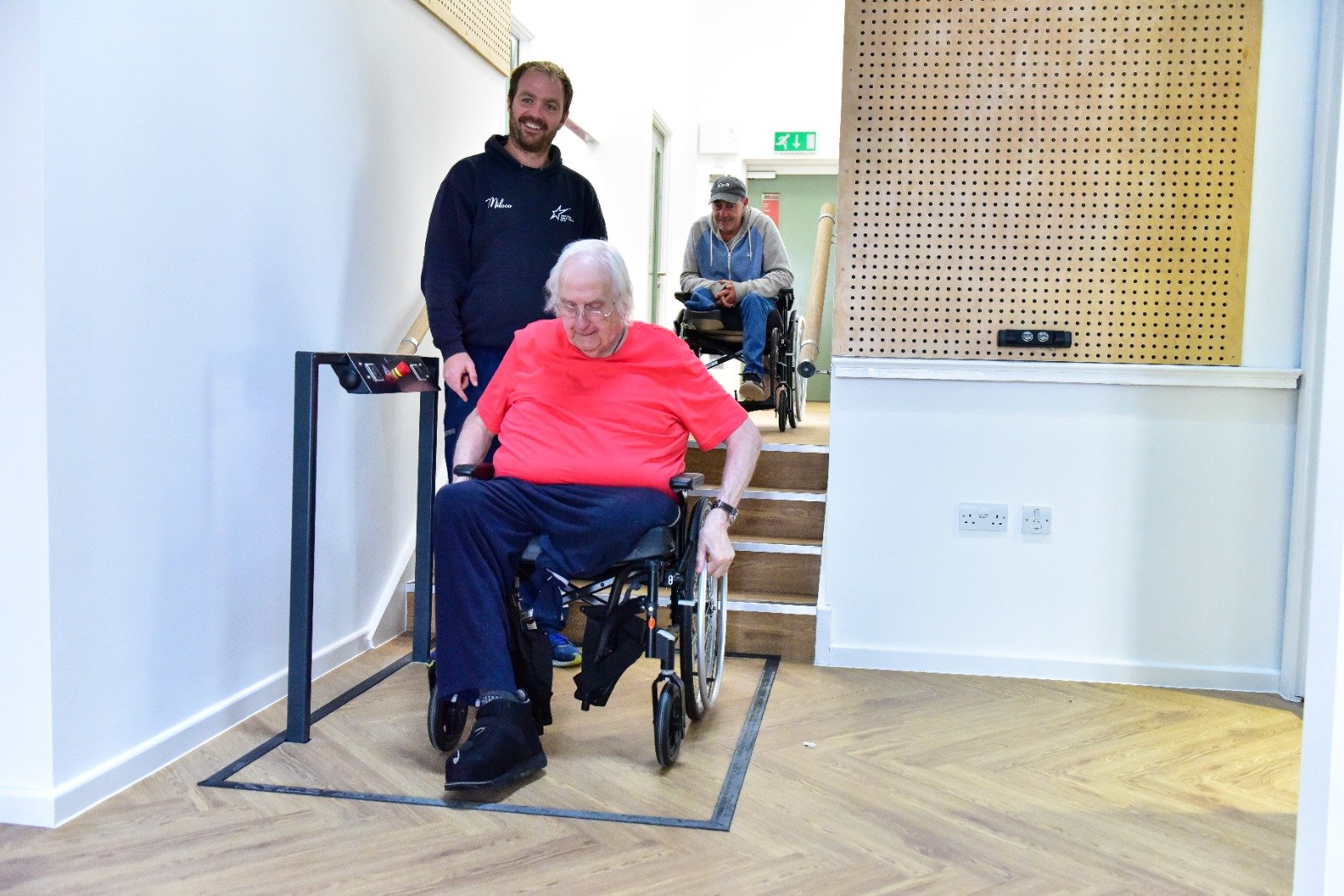 The hidden lift in use transporting people from the upper level of brighton Table Tennis Club to the cafe