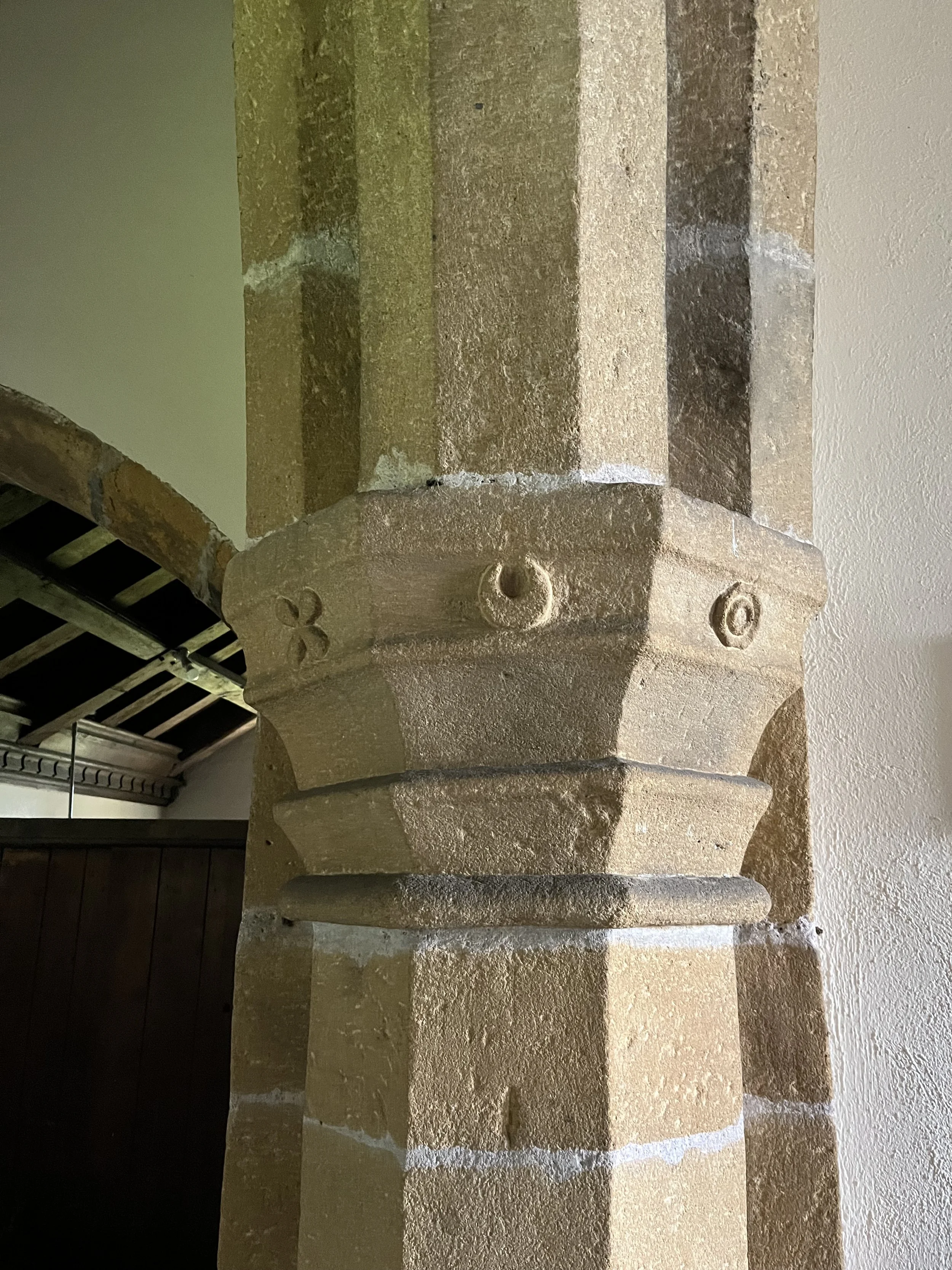 Unusal carvings to the stone capitalsof the columns