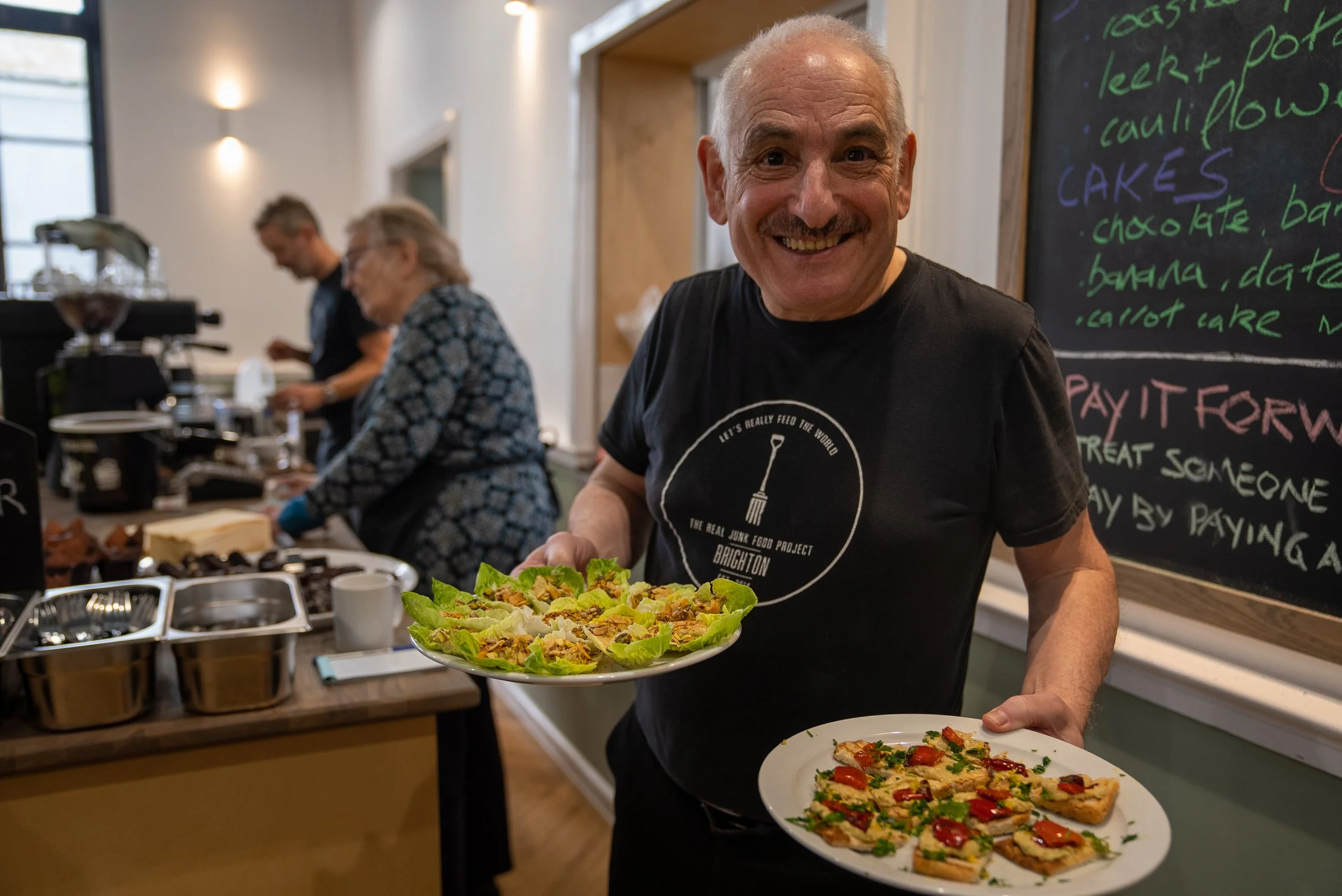 Paul from the real Junk Food Project serving food at the Fitz