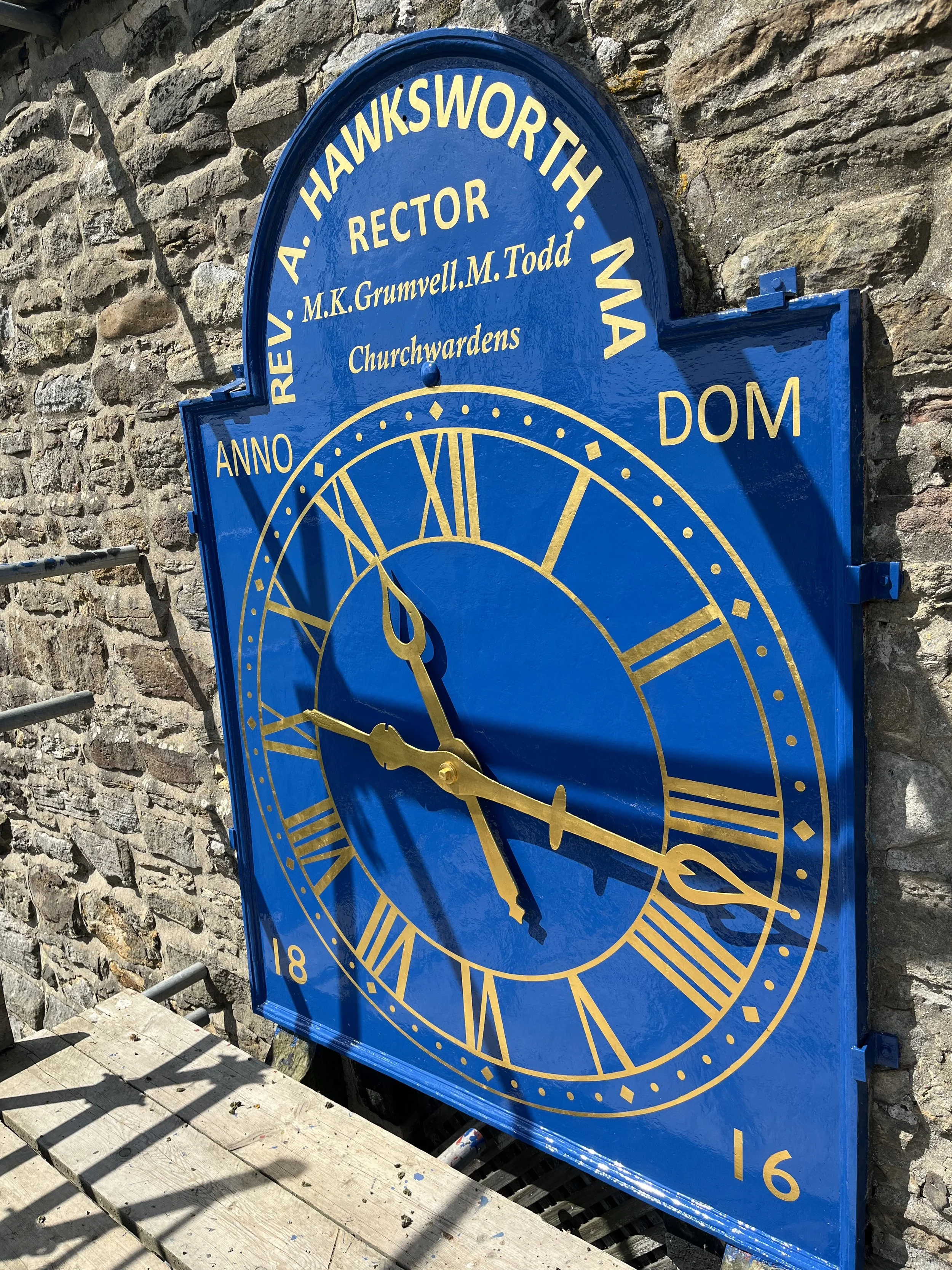 View of the Georgian clock face enscribed with the church wardens