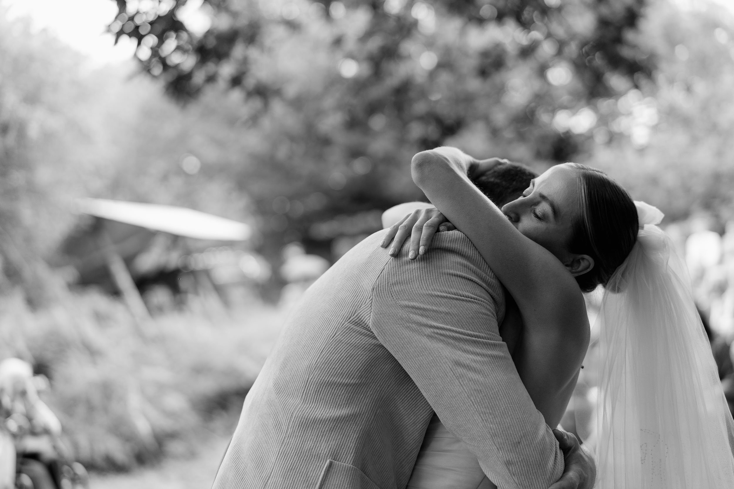 Bride and groom romantic wedding portrait Pembrokeshire countryside and coast