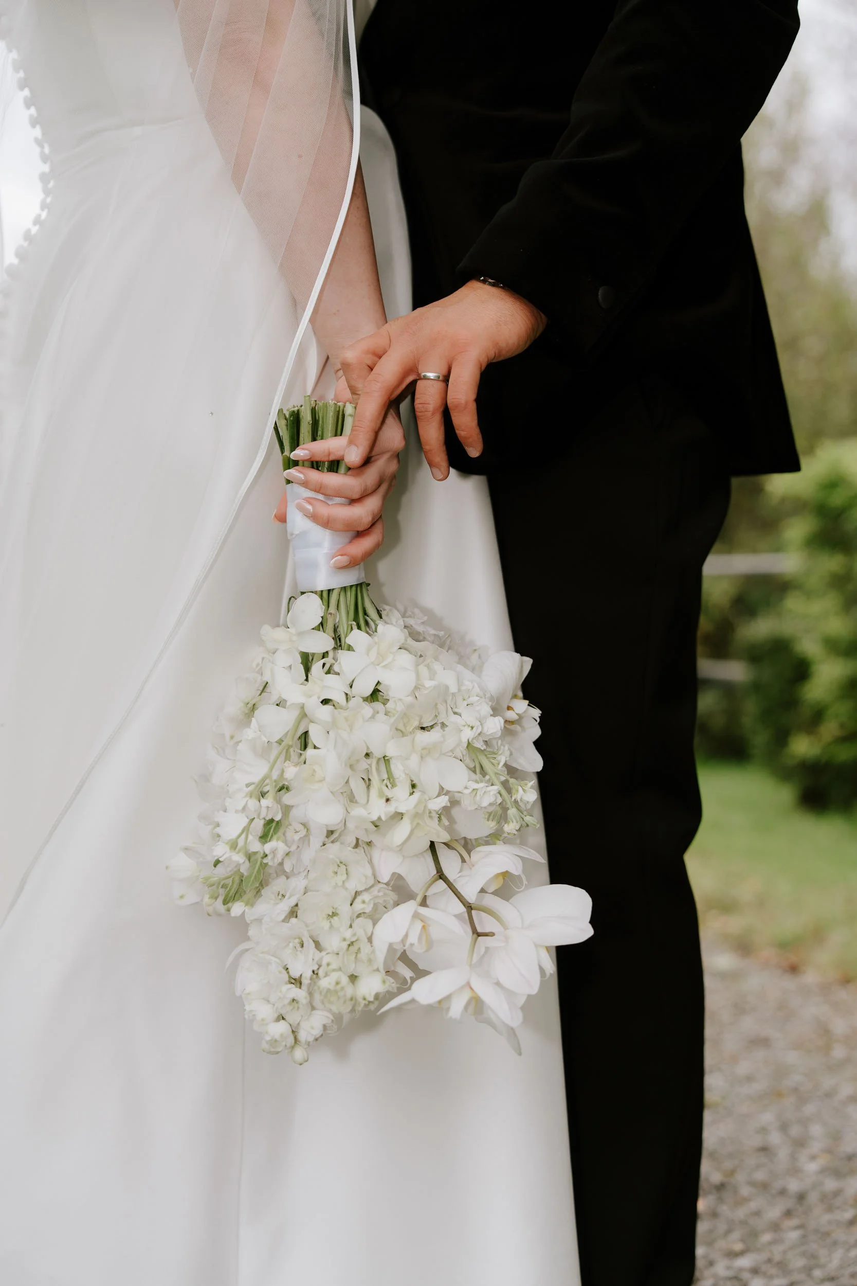 Soft bridal detail photograph with veil and delicate textures