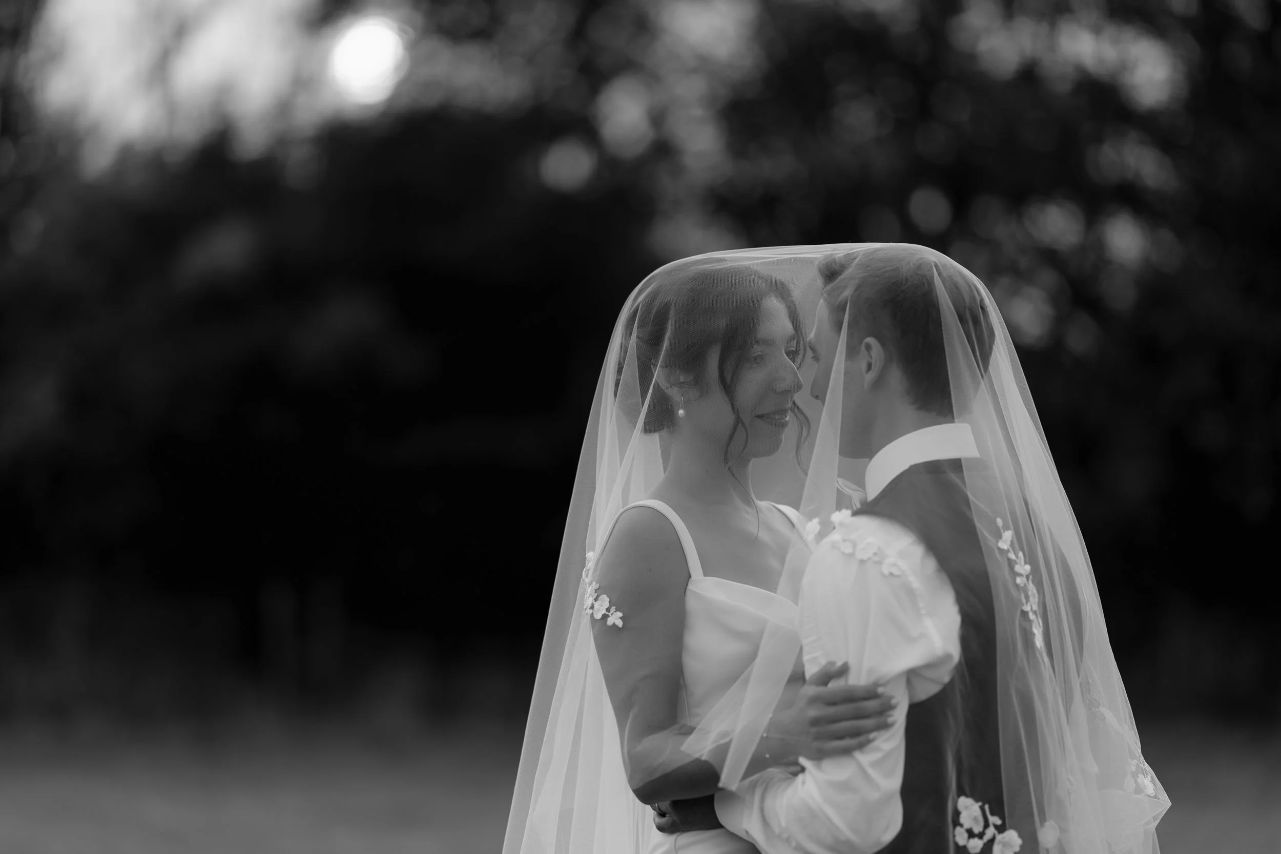 Bride and groom romantic wedding portrait Pembrokeshire countryside and coast