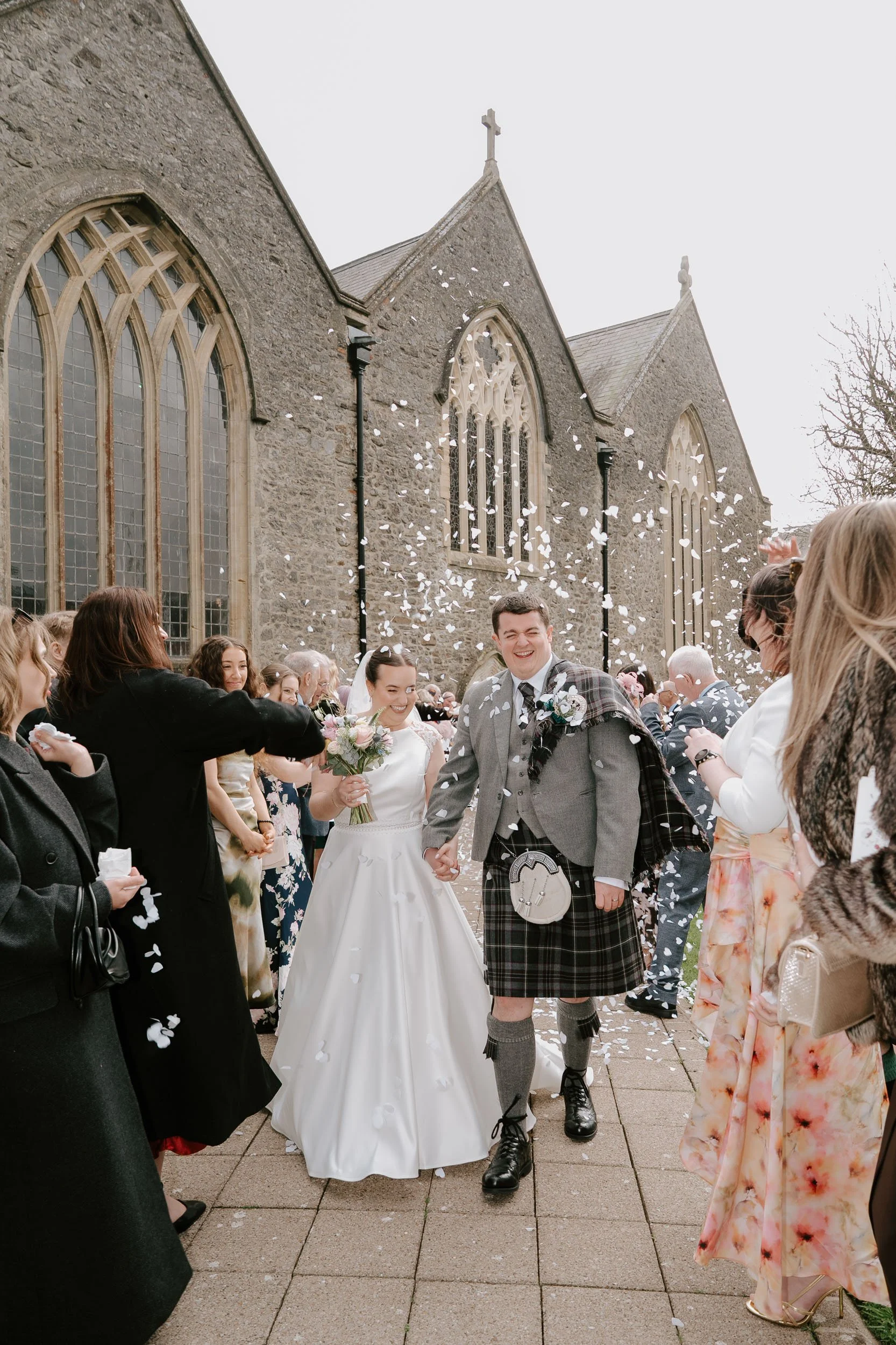 Tenby church wedding exterior guests arriving traditional UK ceremony