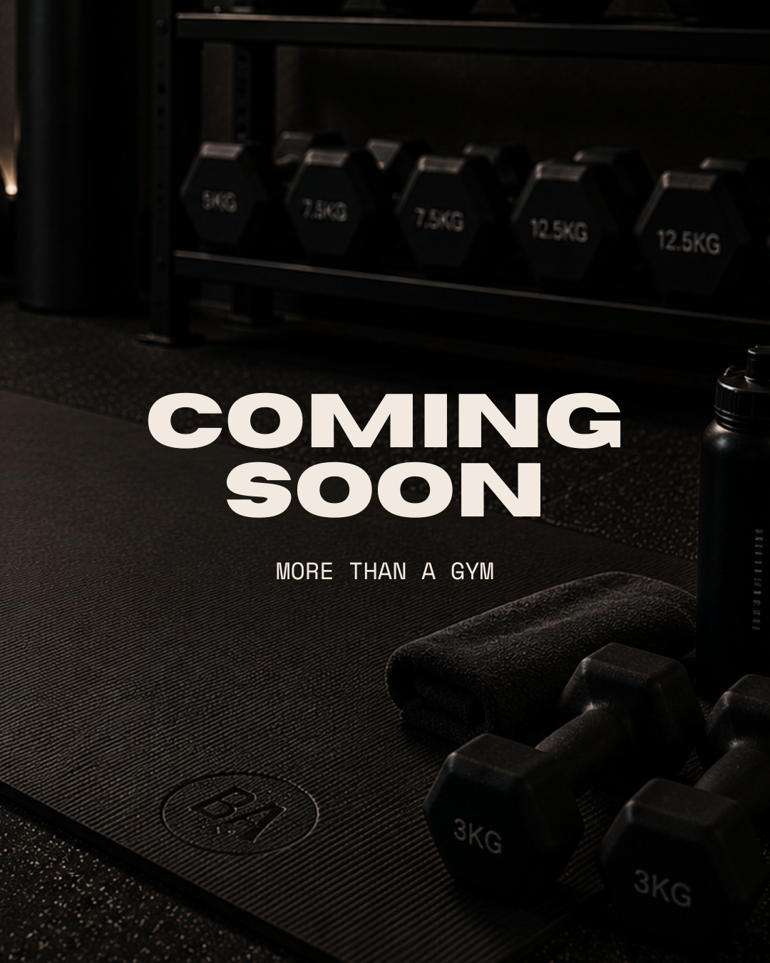 A gym workout area with dumbbells, water bottle, towel, and weight rack, with overlaid text 'Coming Soon' and 'More Than a Gym'.