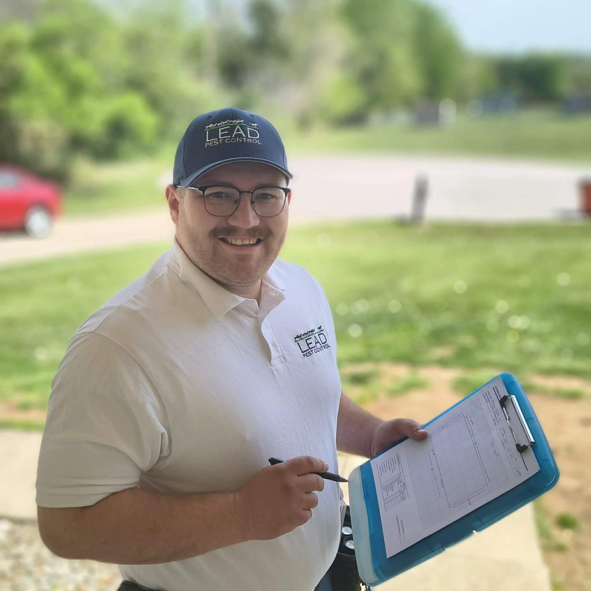 Local pest control technician in Elizabethtown Kentucky preparing for residential service visit and inspection
