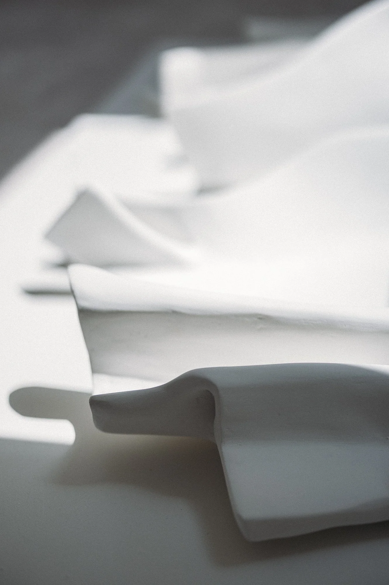 Fabric-and-plaster contemporary wall sculpture — detail from In Yang Series II by Anastasia Budieva (Budini)
