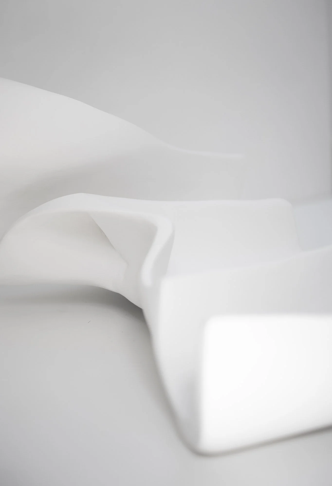 Contemporary wall sculpture low-relief detail - layered folds from In Yang Series I by Budini