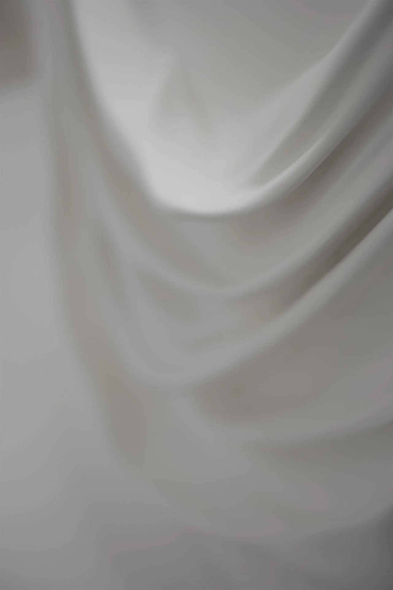 Sculptural wall art close-up - Goddess by Budini, fold and surface texture