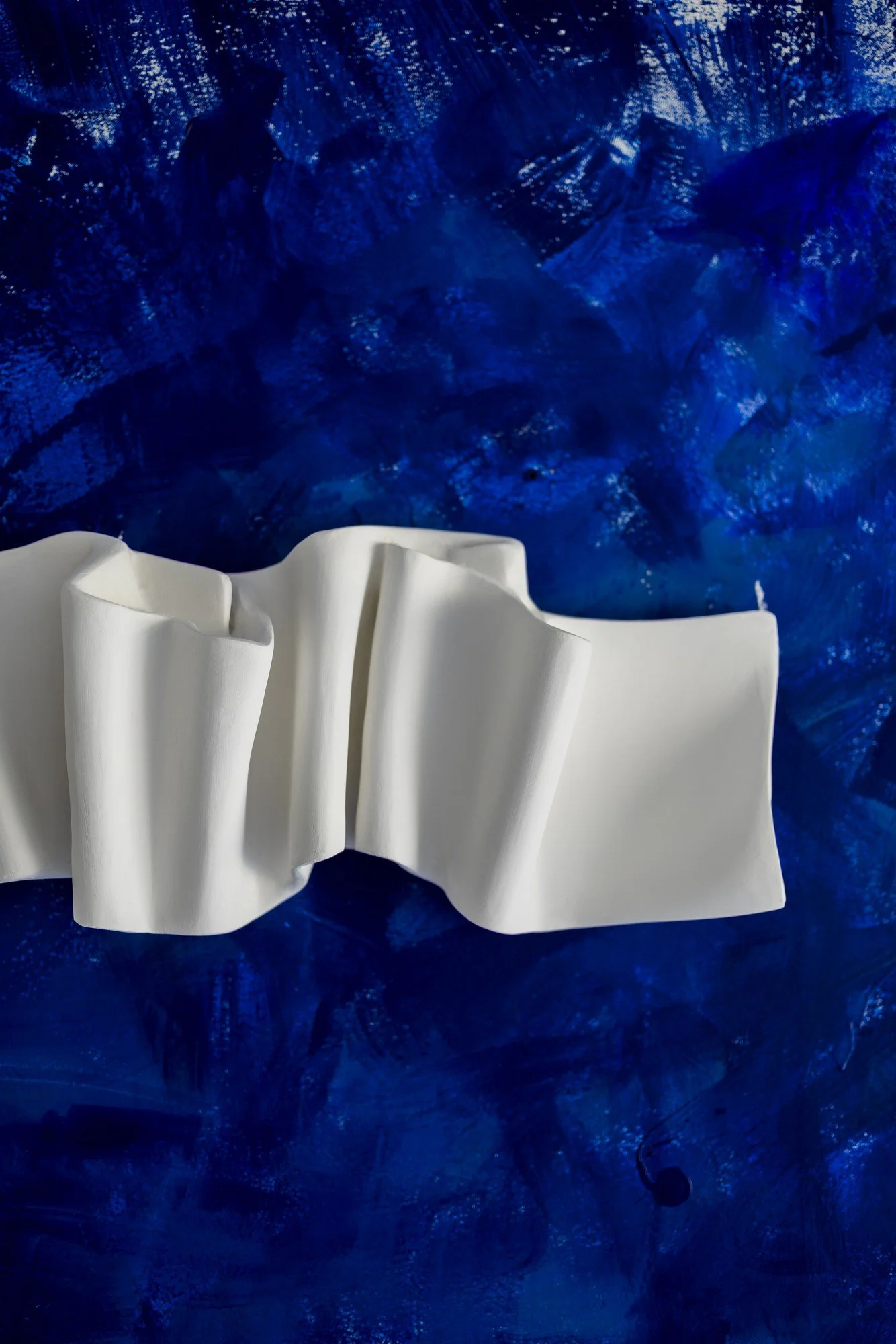 Long wall art by Budini - Snake It Series II, elongated contemporary wall sculpture in fabric and plaster