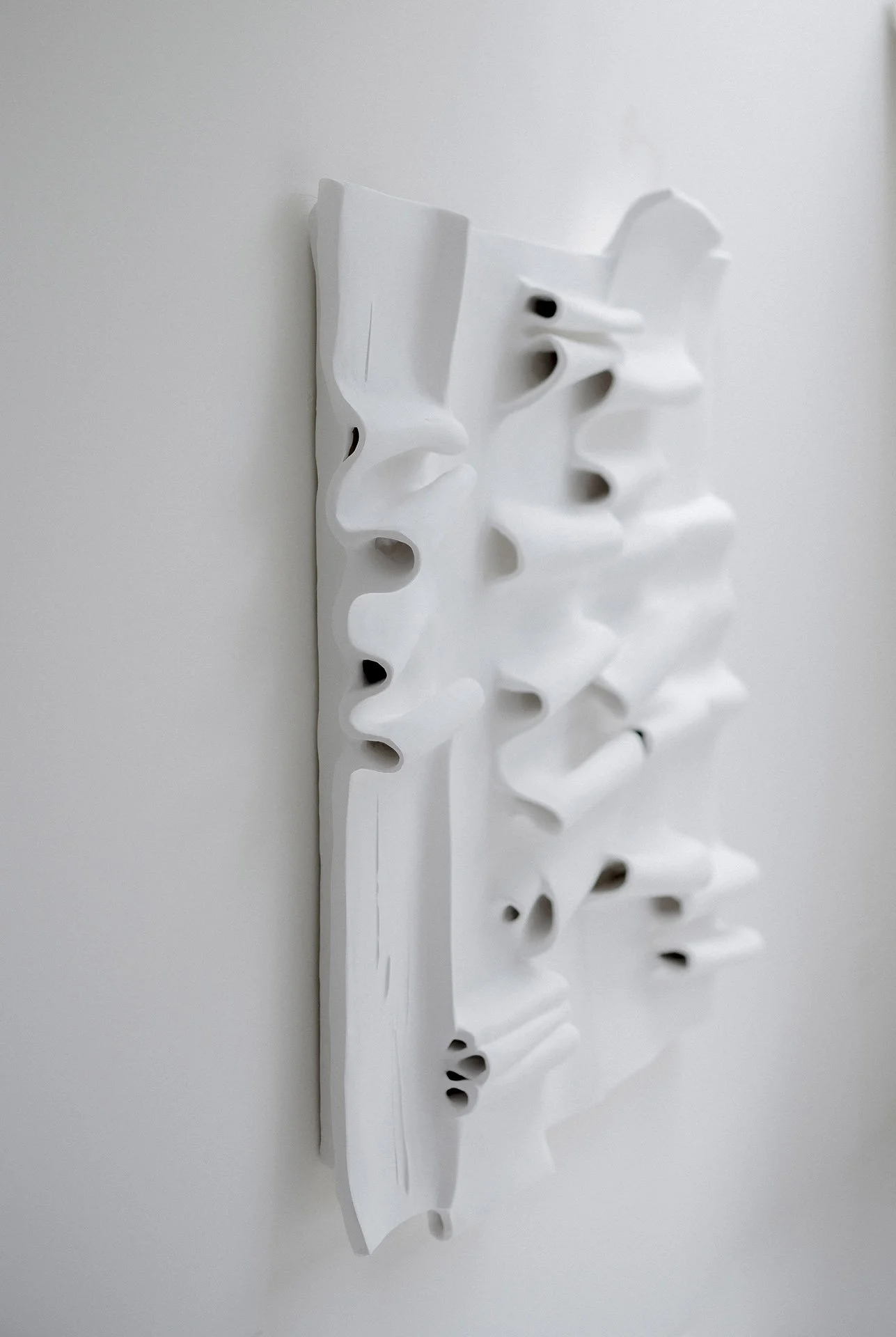 Side profile of The Pulse - 3D wall art showing 15 cm of sculptural depth and relief
