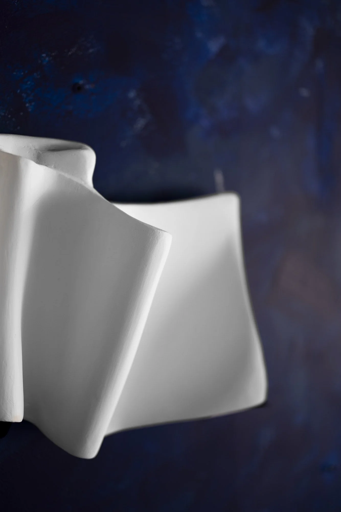 Snake It Series II - horizontal minimalist wall art in white plaster by London artist Budini, 79×30 cm