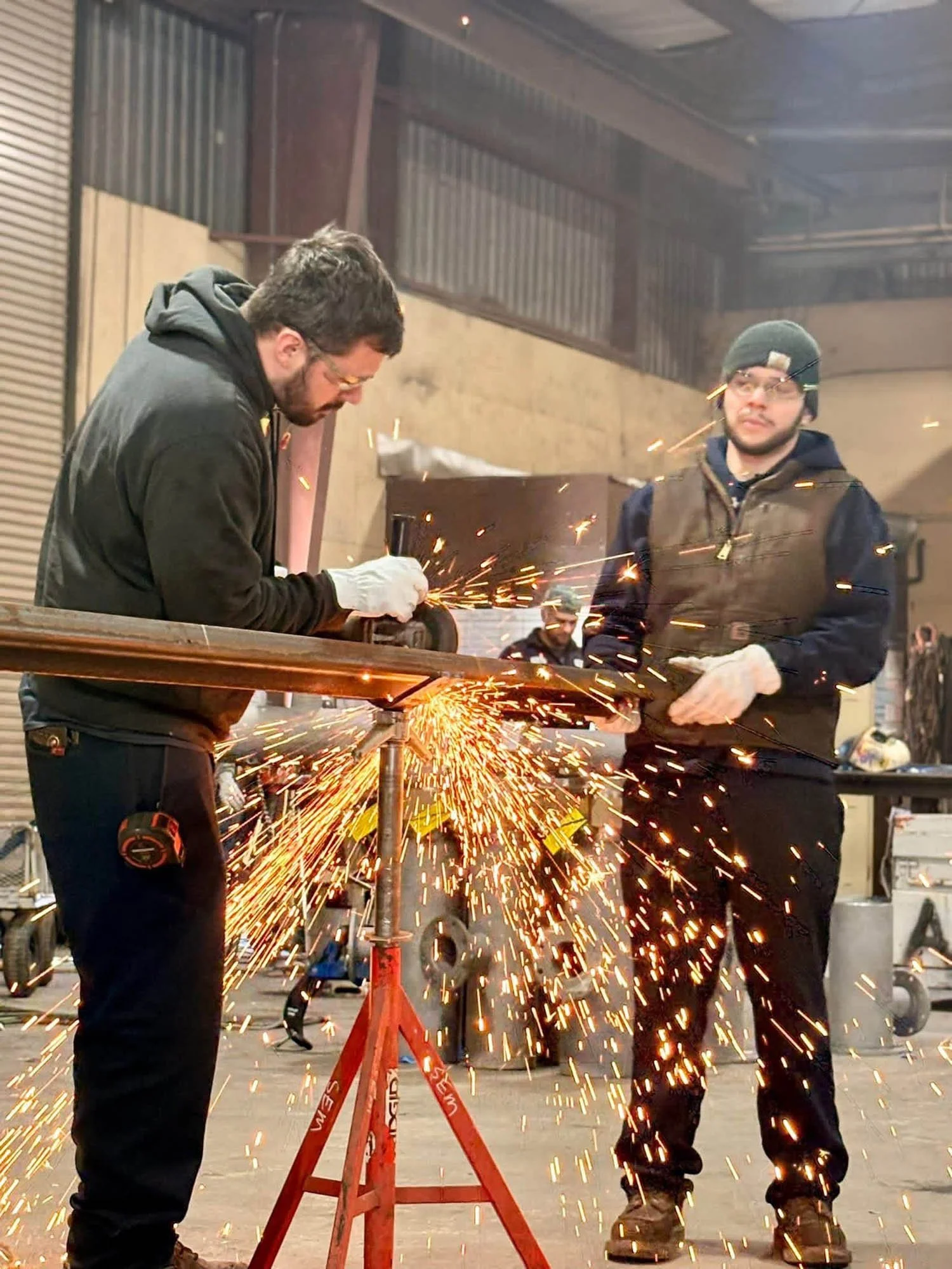 two men welding