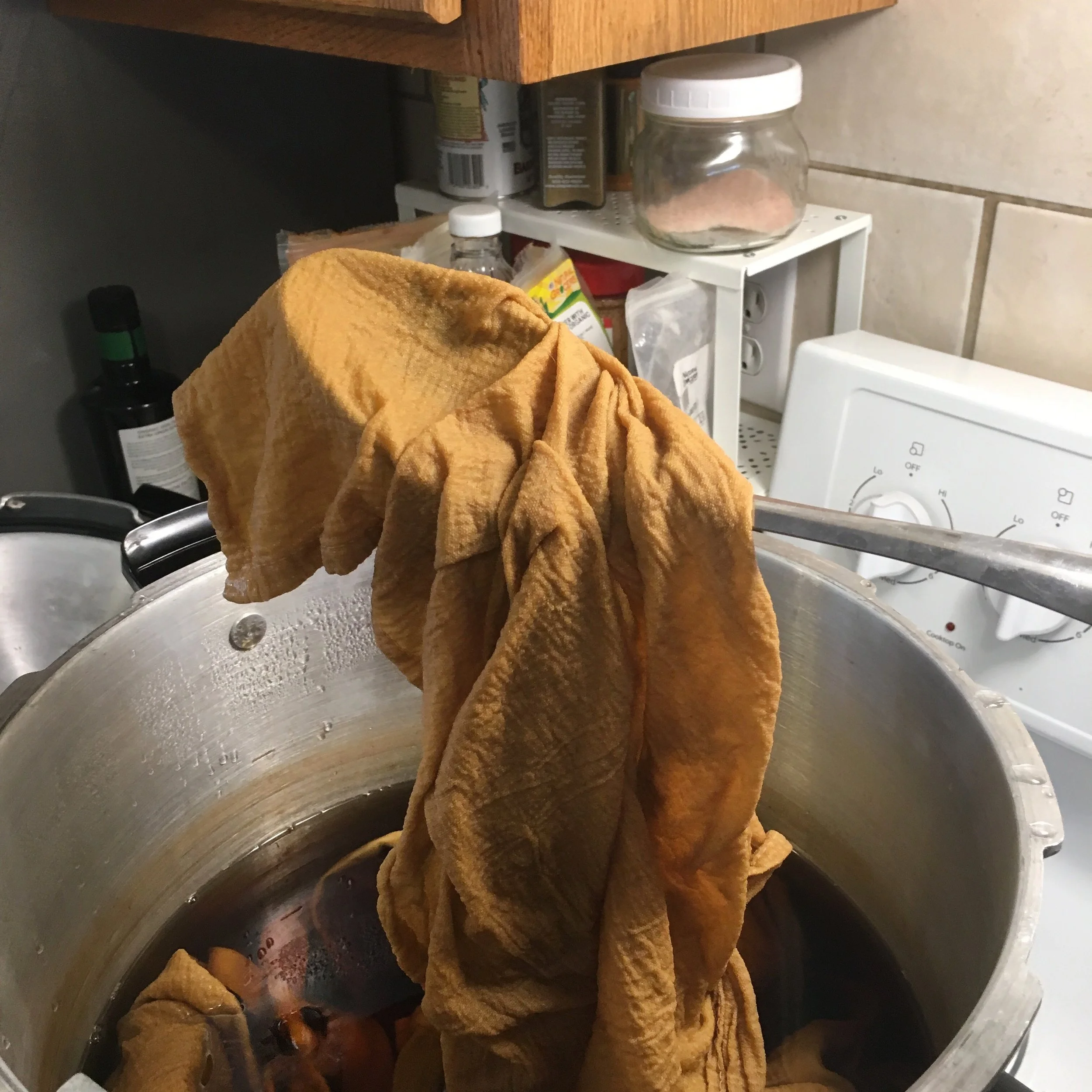 fabric_being_dyed_in_pot.jpg