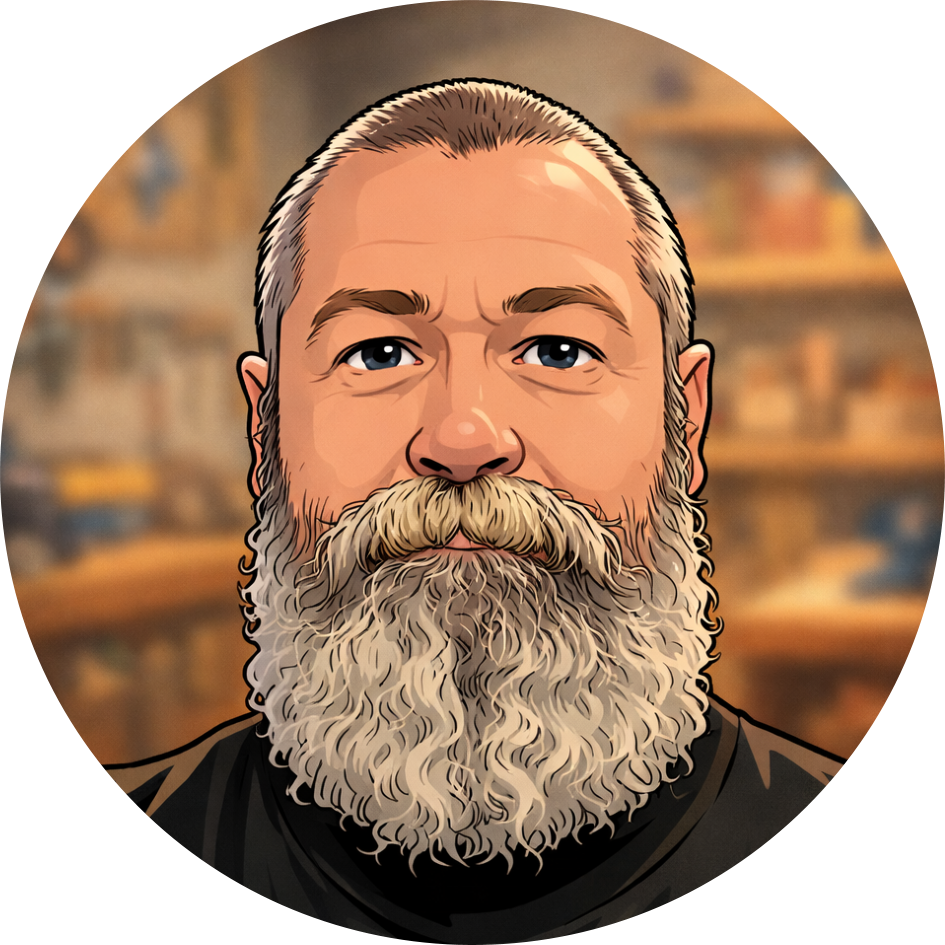 Cartoon image of a man with a full, gray beard and short gray hair, wearing a black shirt, with a blurred bookshelf background.