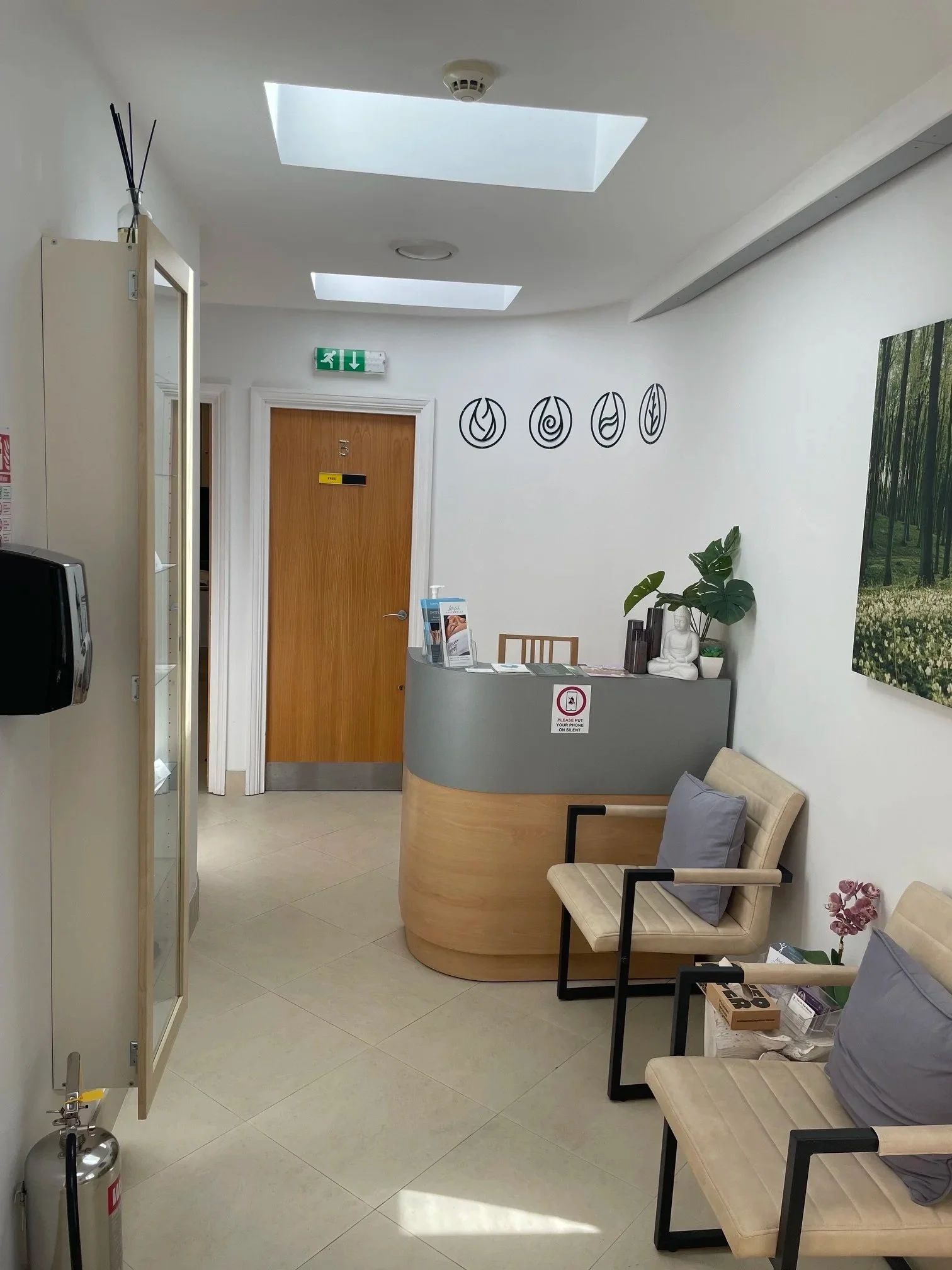 View of massage clinic waiting room with seats and waiting area
